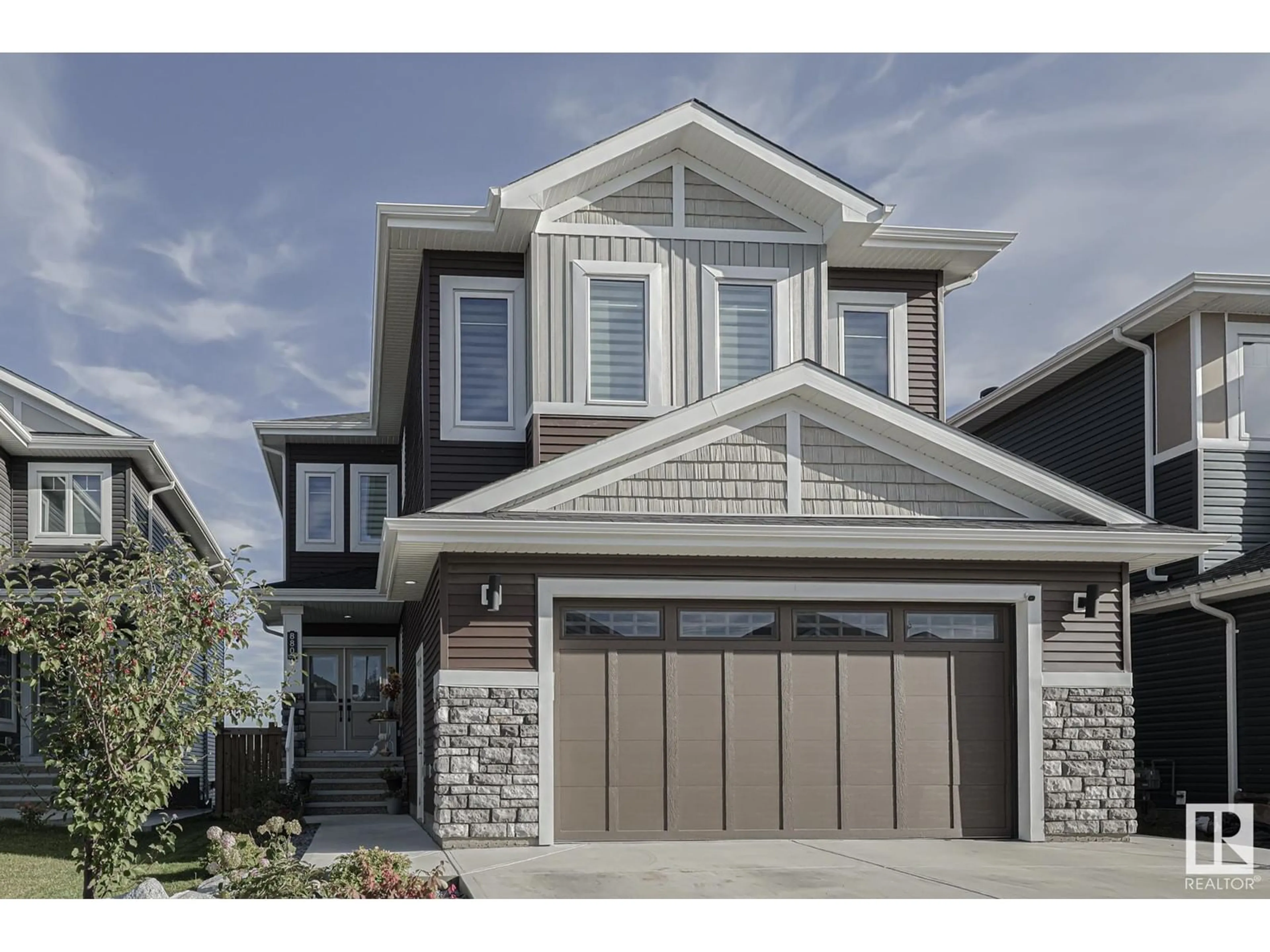 Frontside or backside of a home, cottage for 880 EBBERS CR NW, Edmonton Alberta T5Y3V1