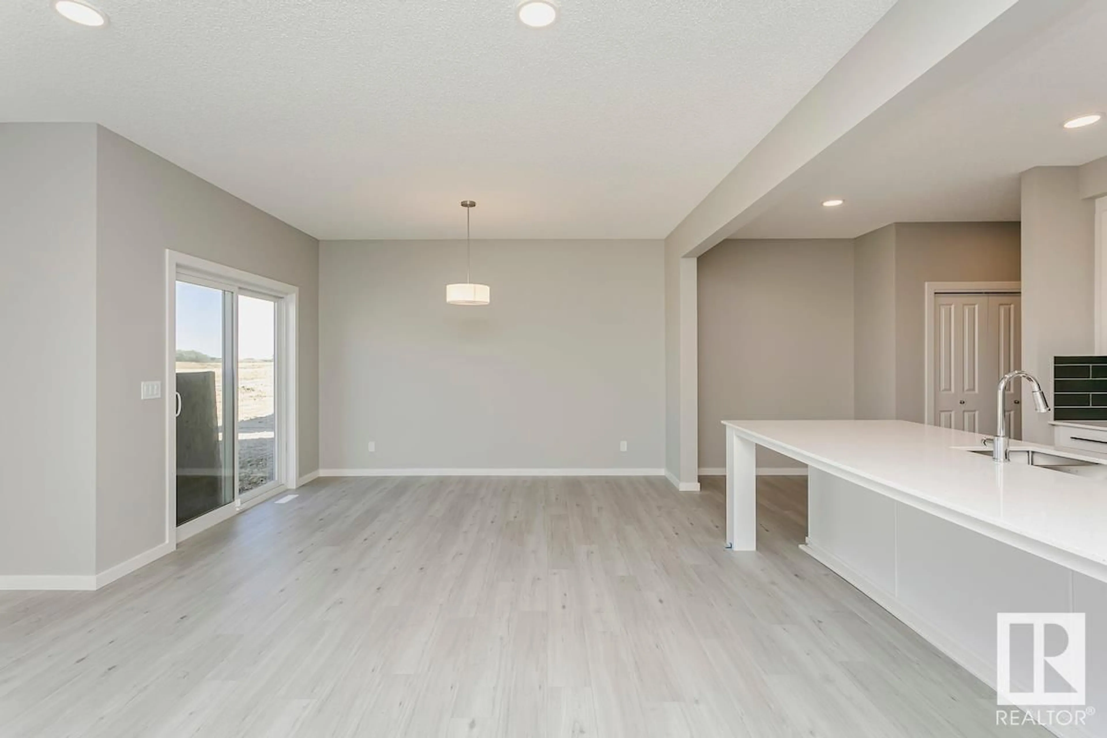 A pic of a room, wood floors for 653 KINGLET BV NW, Edmonton Alberta T5S2B9