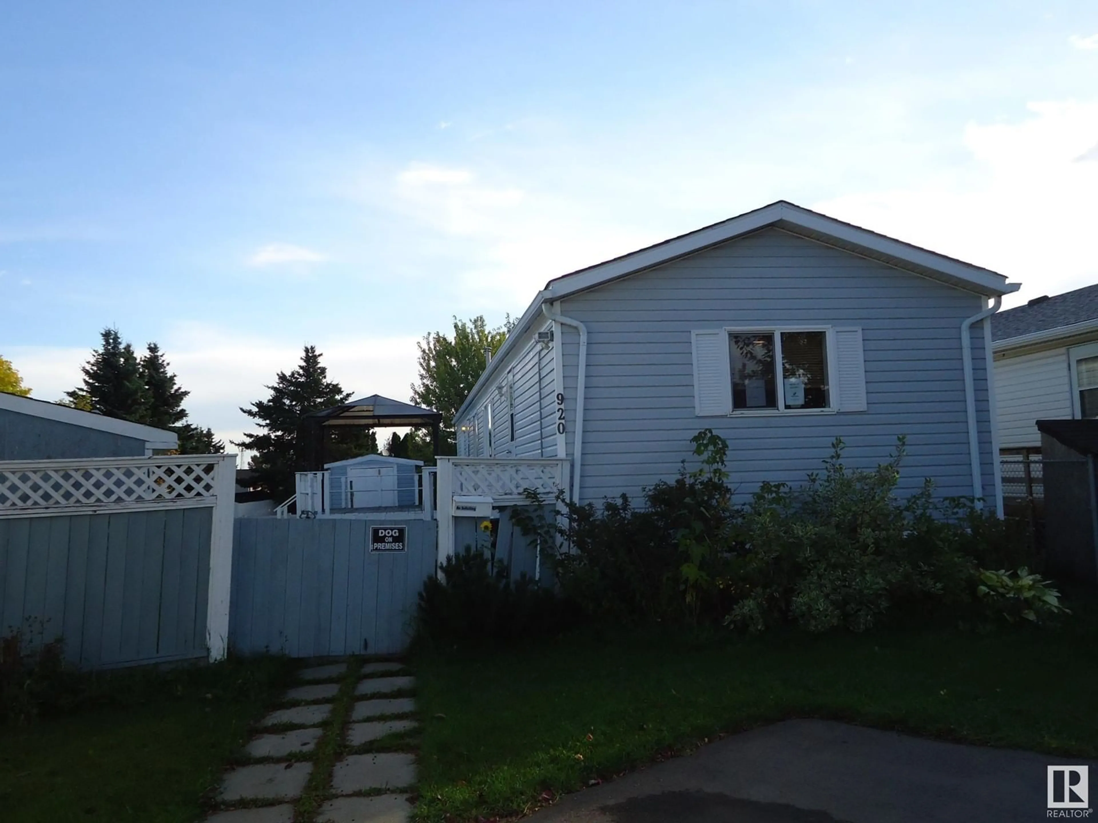 Frontside or backside of a home, the fenced backyard for 920 Jubilee CL, Sherwood Park Alberta T8H2G3