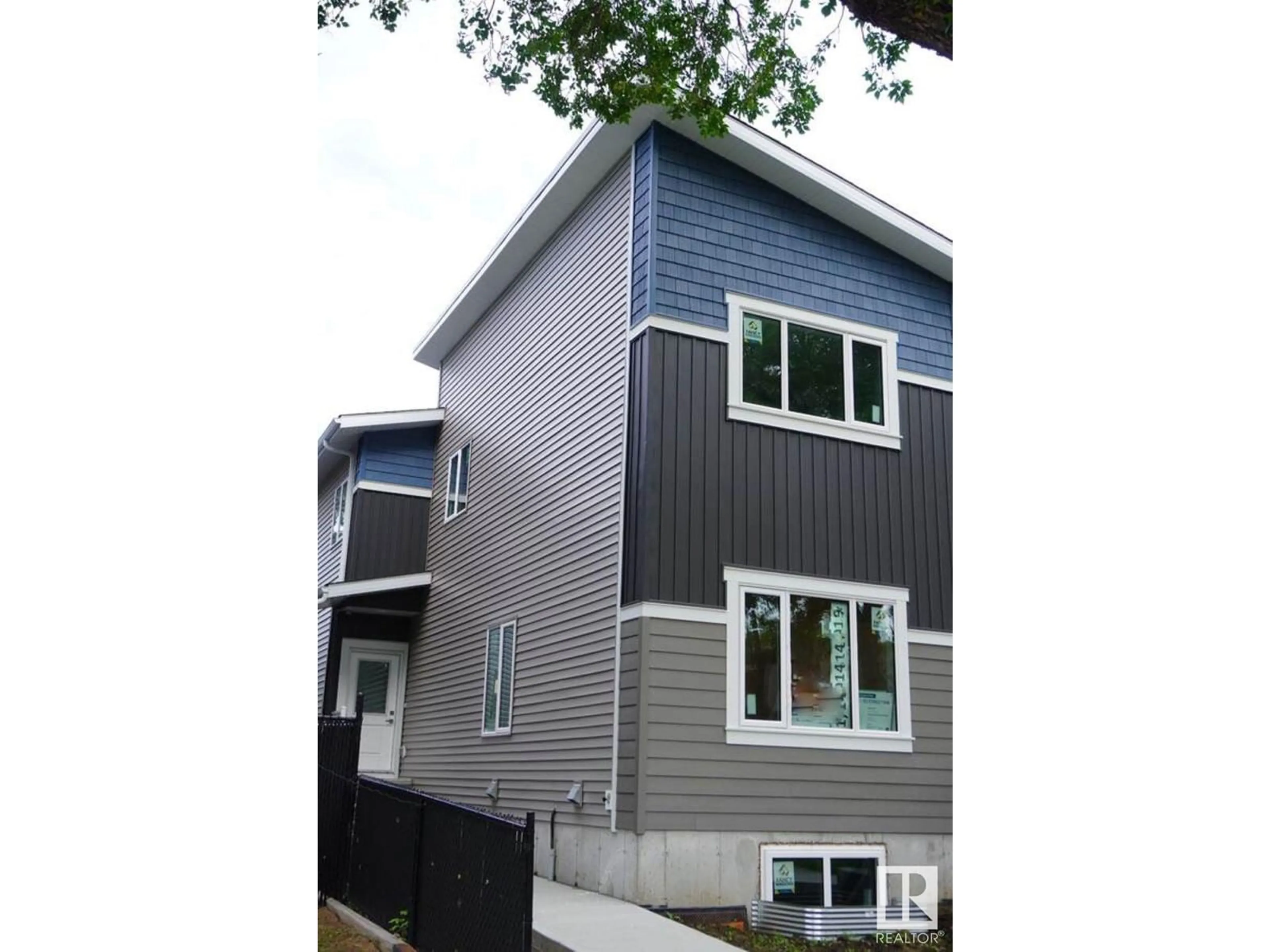 Frontside or backside of a home, the front or back of building for #2 12014 92 ST NW, Edmonton Alberta T5G1A9