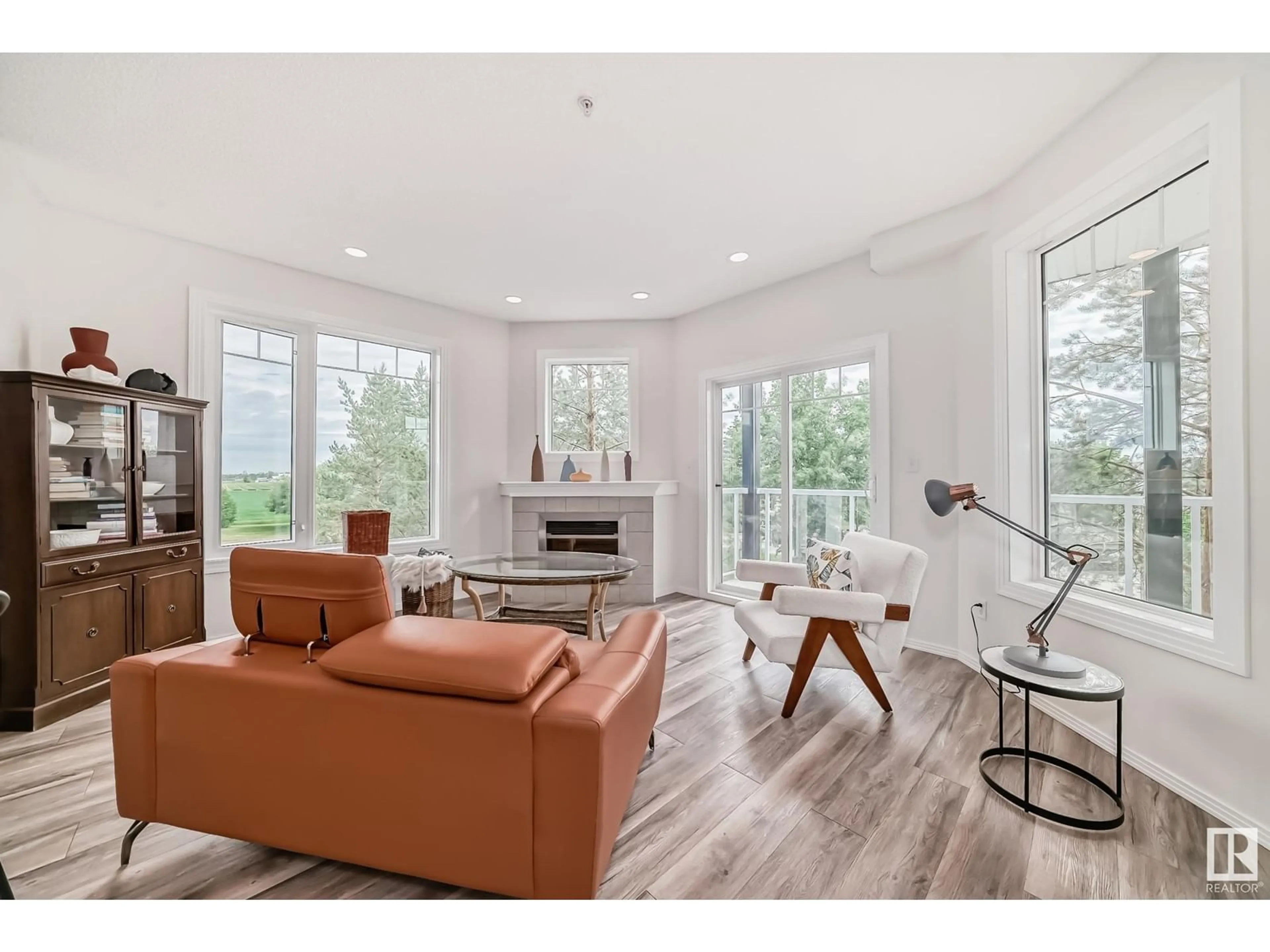 Living room, wood floors for #319 12111 51 AV NW, Edmonton Alberta T6H6A3