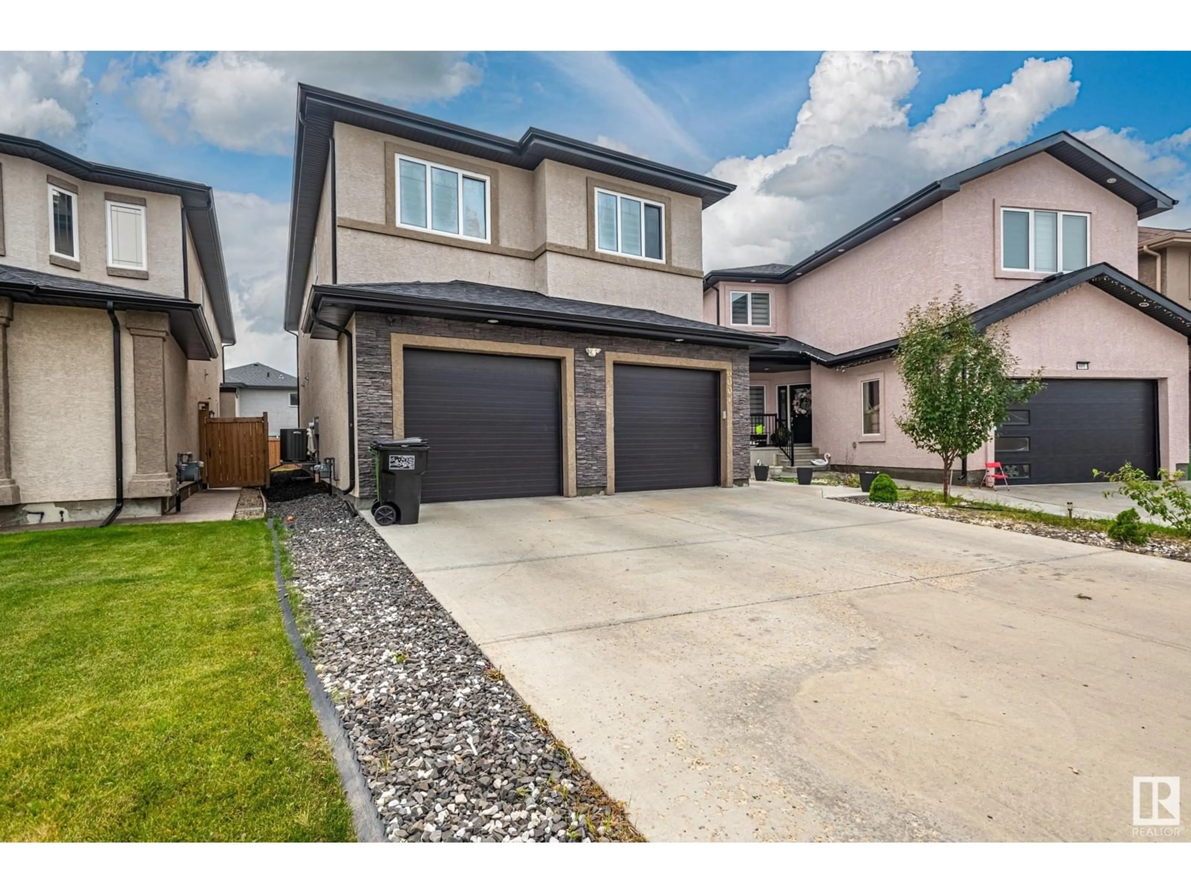 Frontside or backside of a home, the street view for 6007 171 AV NW, Edmonton Alberta T5Y3S6