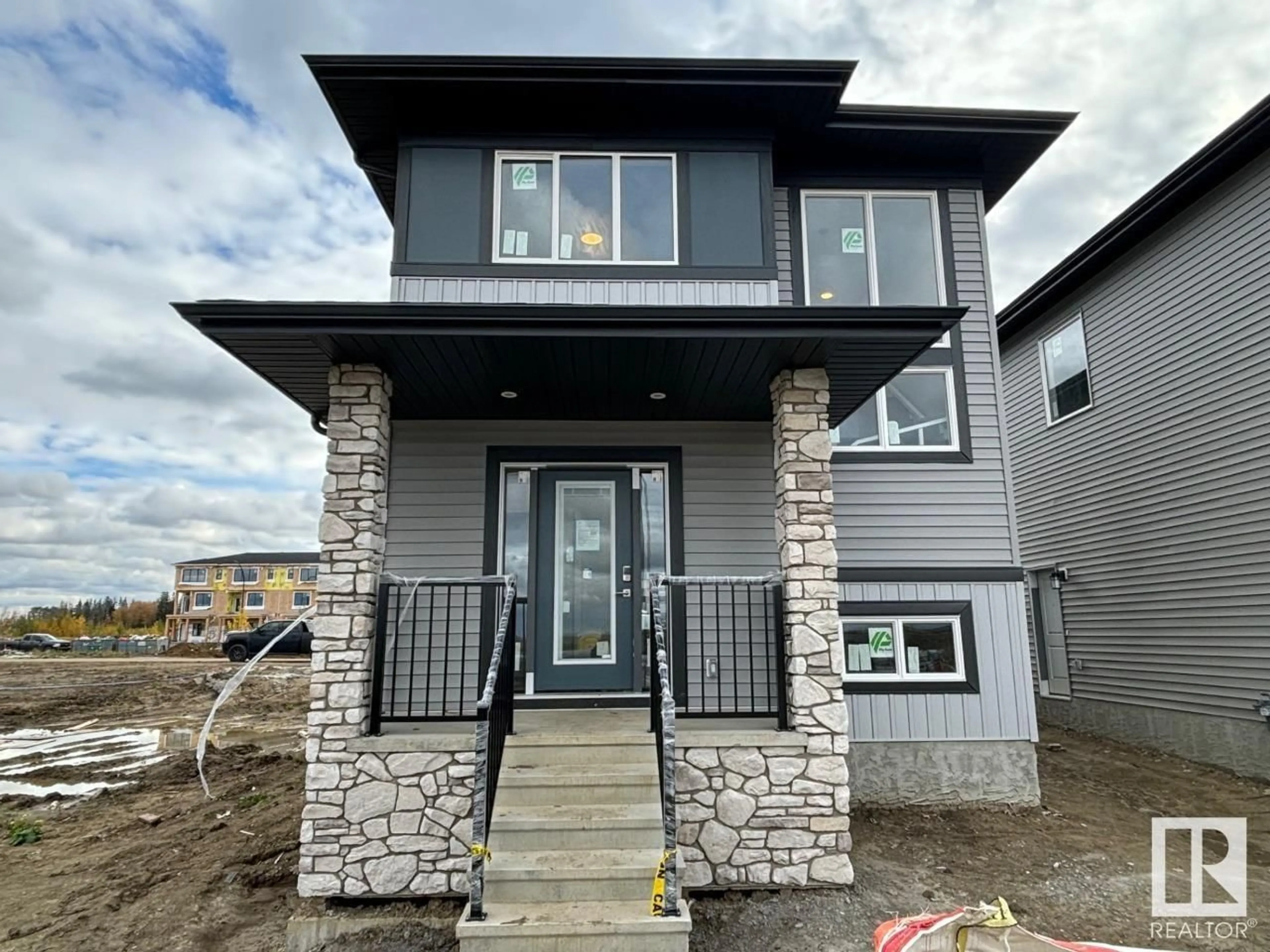 Frontside or backside of a home, the front or back of building for 33 GAMBEL LO, Spruce Grove Alberta T7X4B9