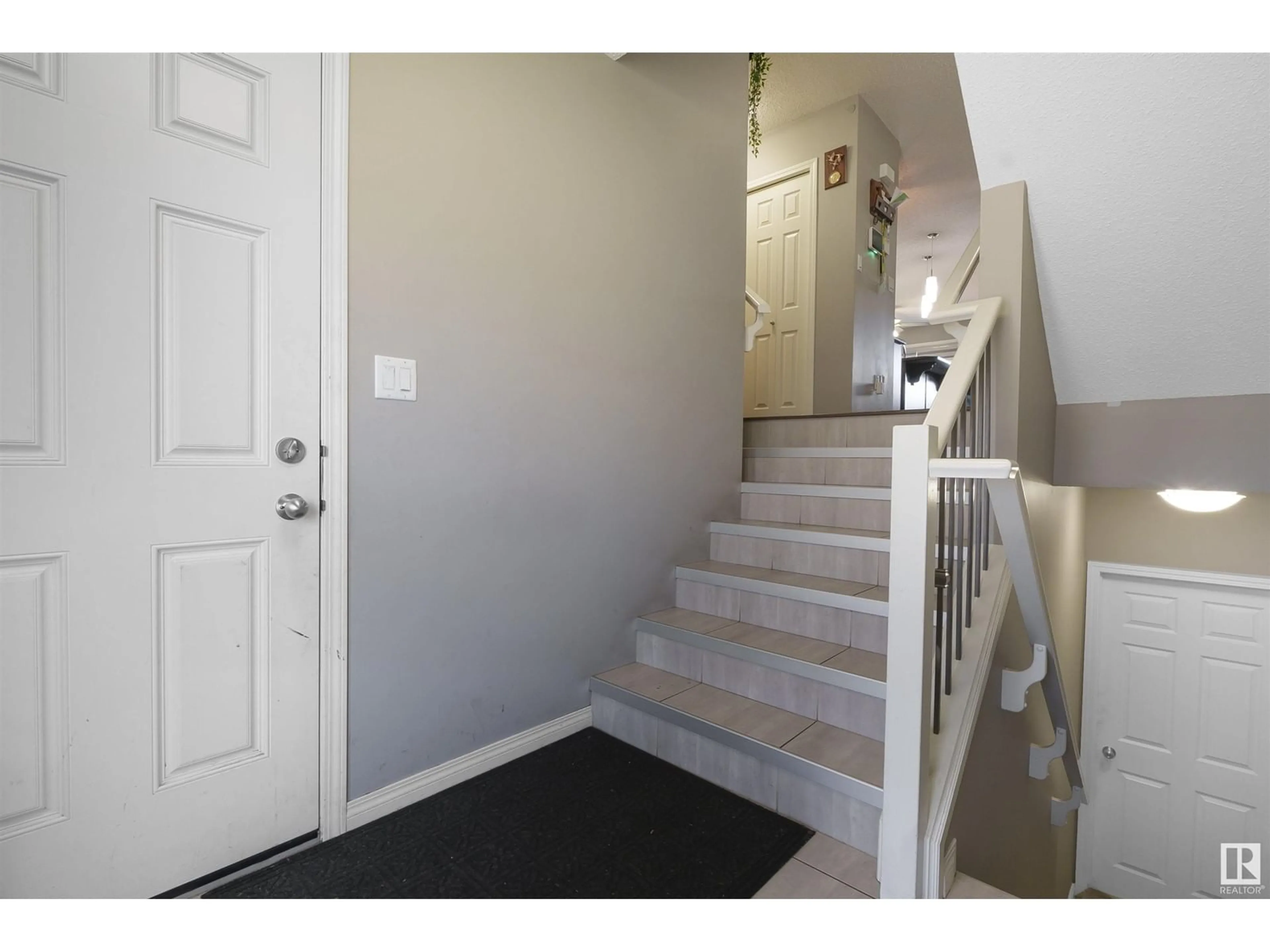 Indoor entryway, carpet floors for 2304 86 ST SW, Edmonton Alberta T6X2G3