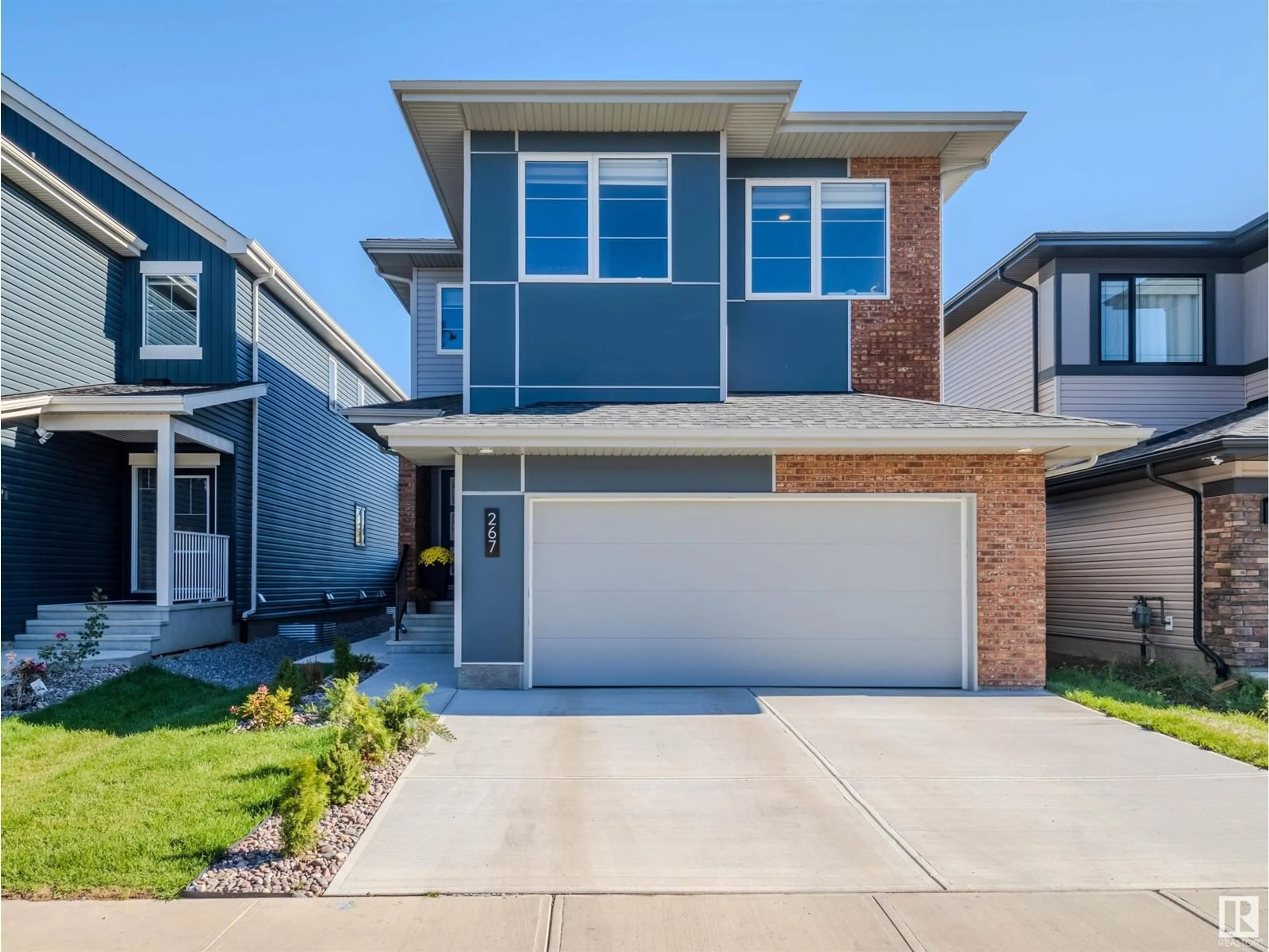 Frontside or backside of a home, the street view for 267 GLENRIDDING RAVINE RD SW, Edmonton Alberta T6W5C3