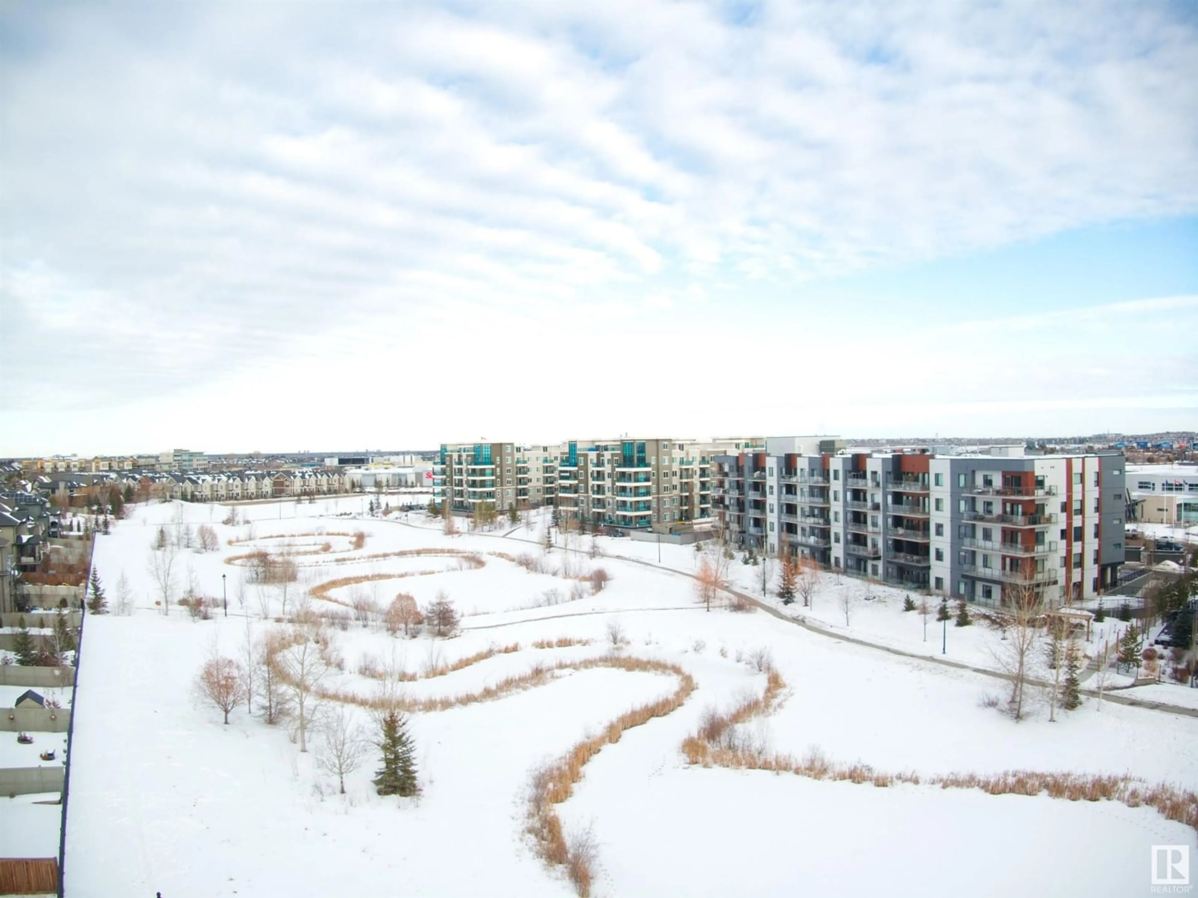 A pic from exterior of the house or condo, the view of city buildings for #407 1316 WINDERMERE WY SW, Edmonton Alberta T6W2J3