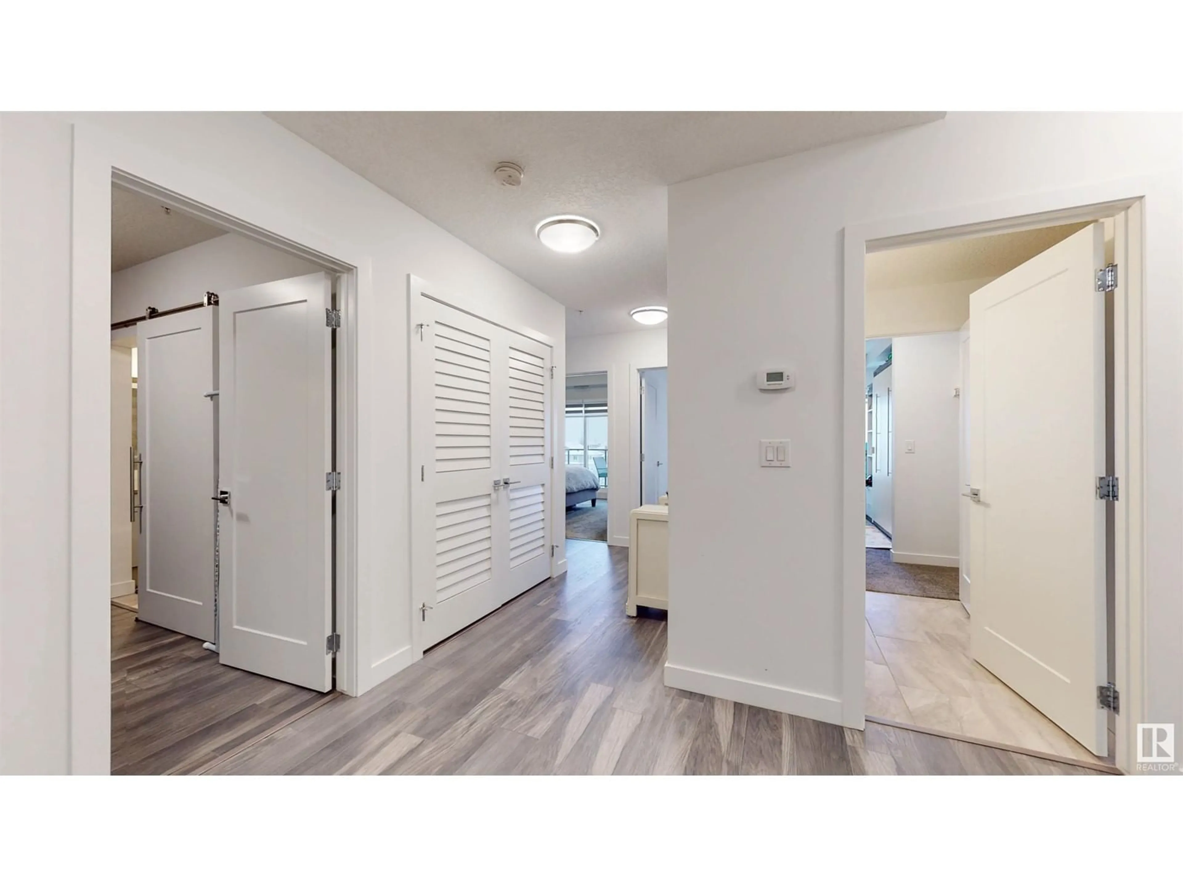 Indoor entryway, wood floors for #407 1316 WINDERMERE WY SW, Edmonton Alberta T6W2J3