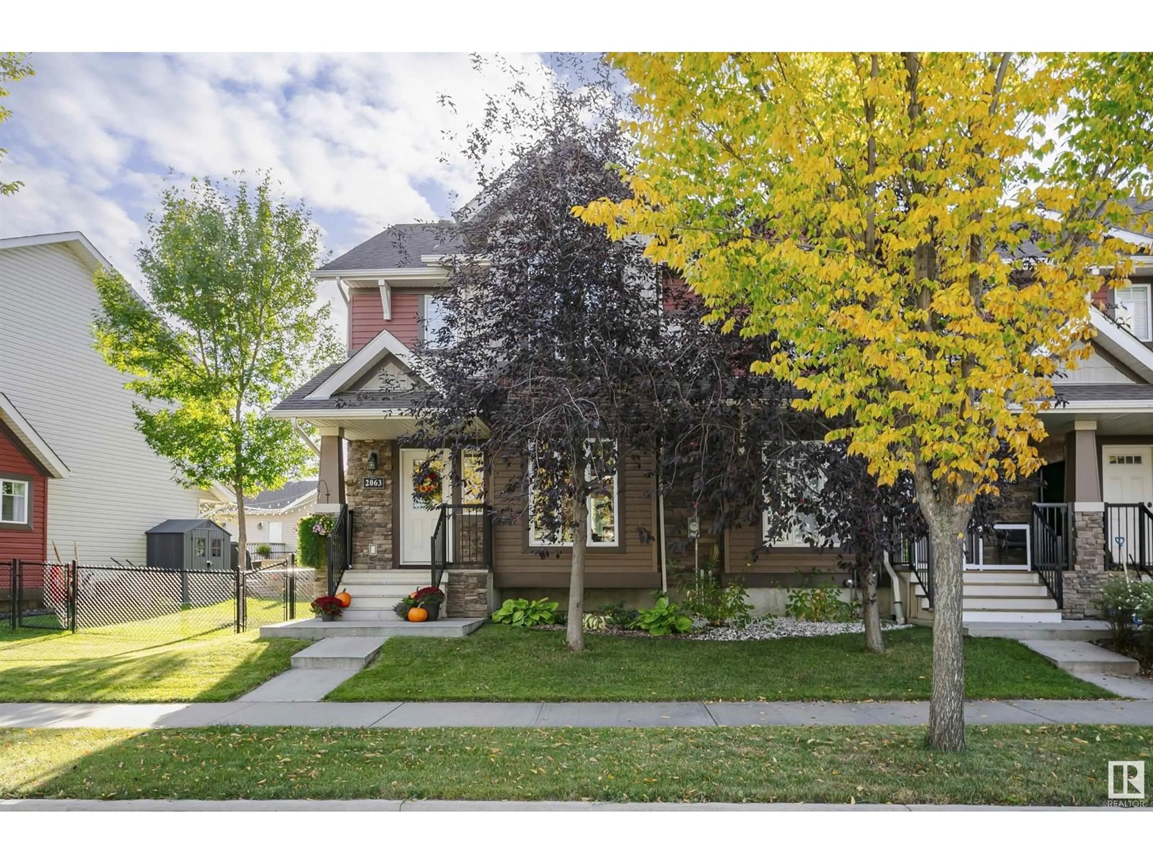 Frontside or backside of a home for 2063 TRUMPETER WY NW, Edmonton Alberta T5S0E7