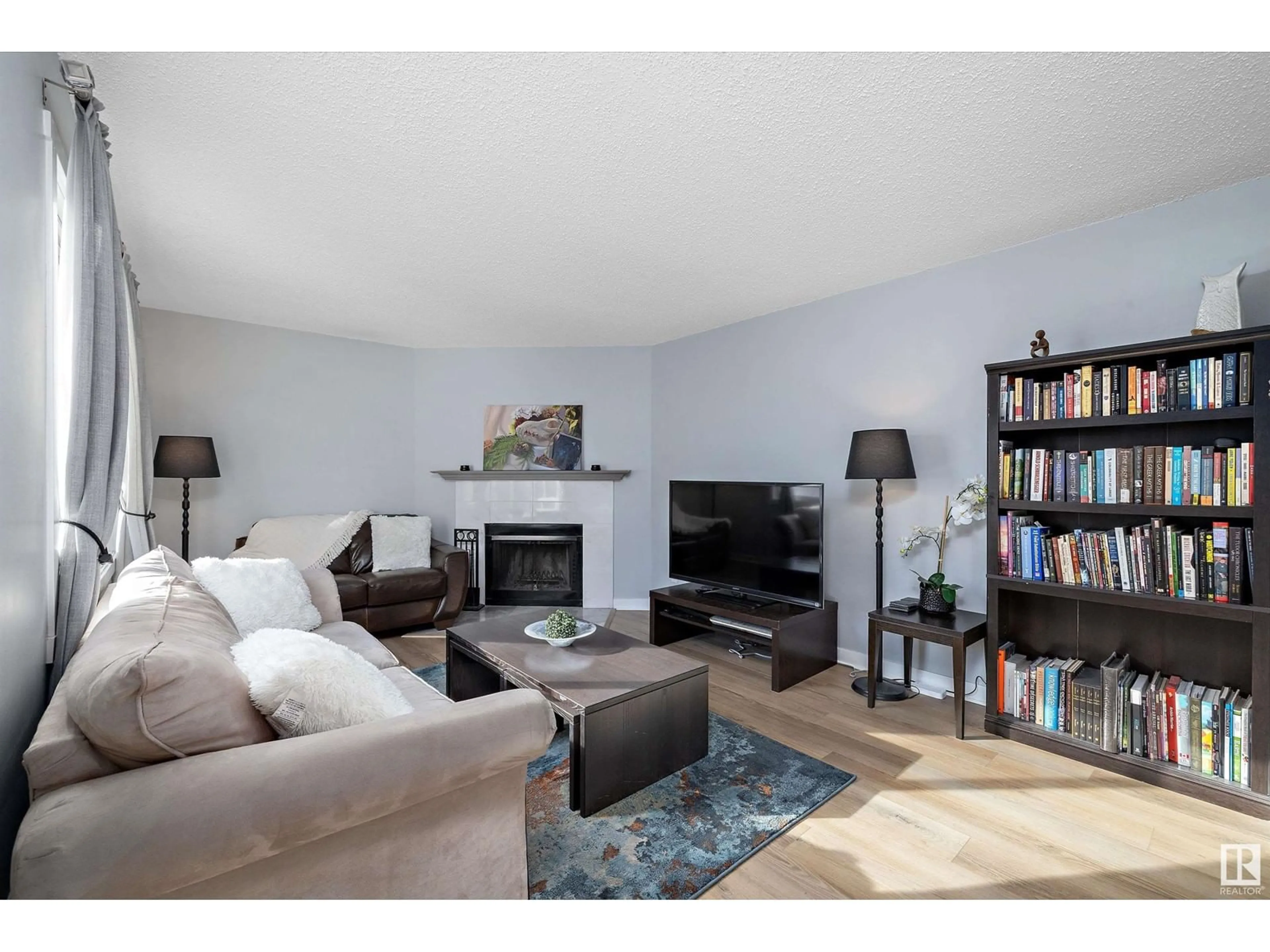 Living room for #111 14707 53 AV NW, Edmonton Alberta T6H5C9