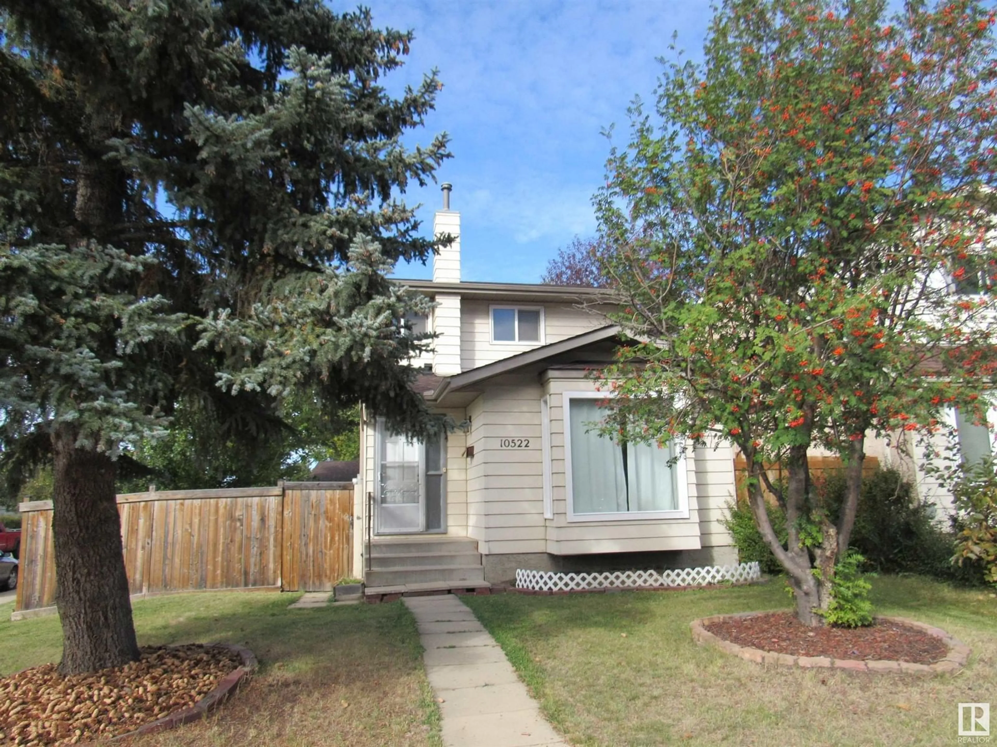 Frontside or backside of a home for 10522 21 AV NW, Edmonton Alberta T6J5G9