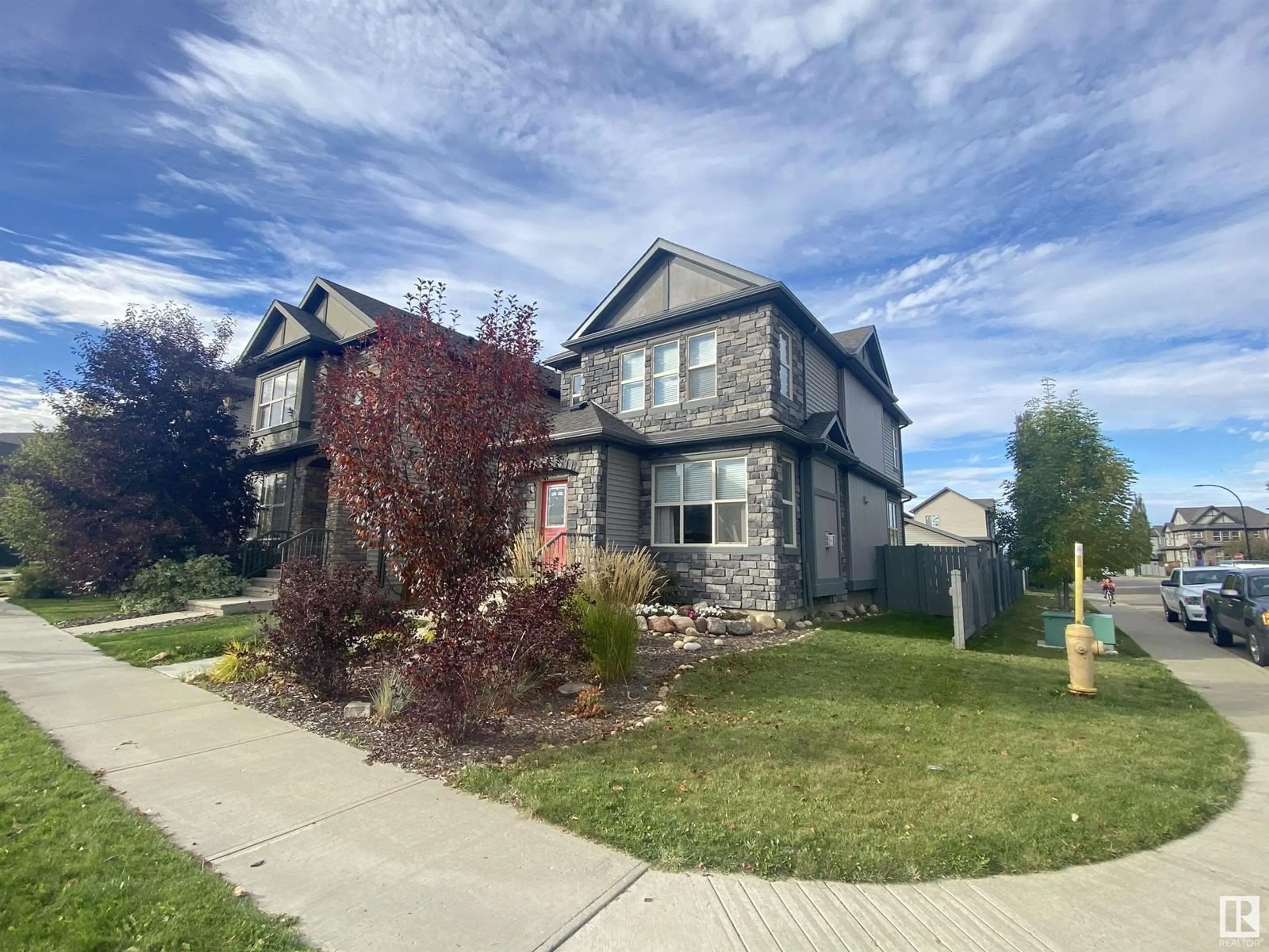 Frontside or backside of a home, the street view for 102 GILMORE WY, Spruce Grove Alberta T7X0M5