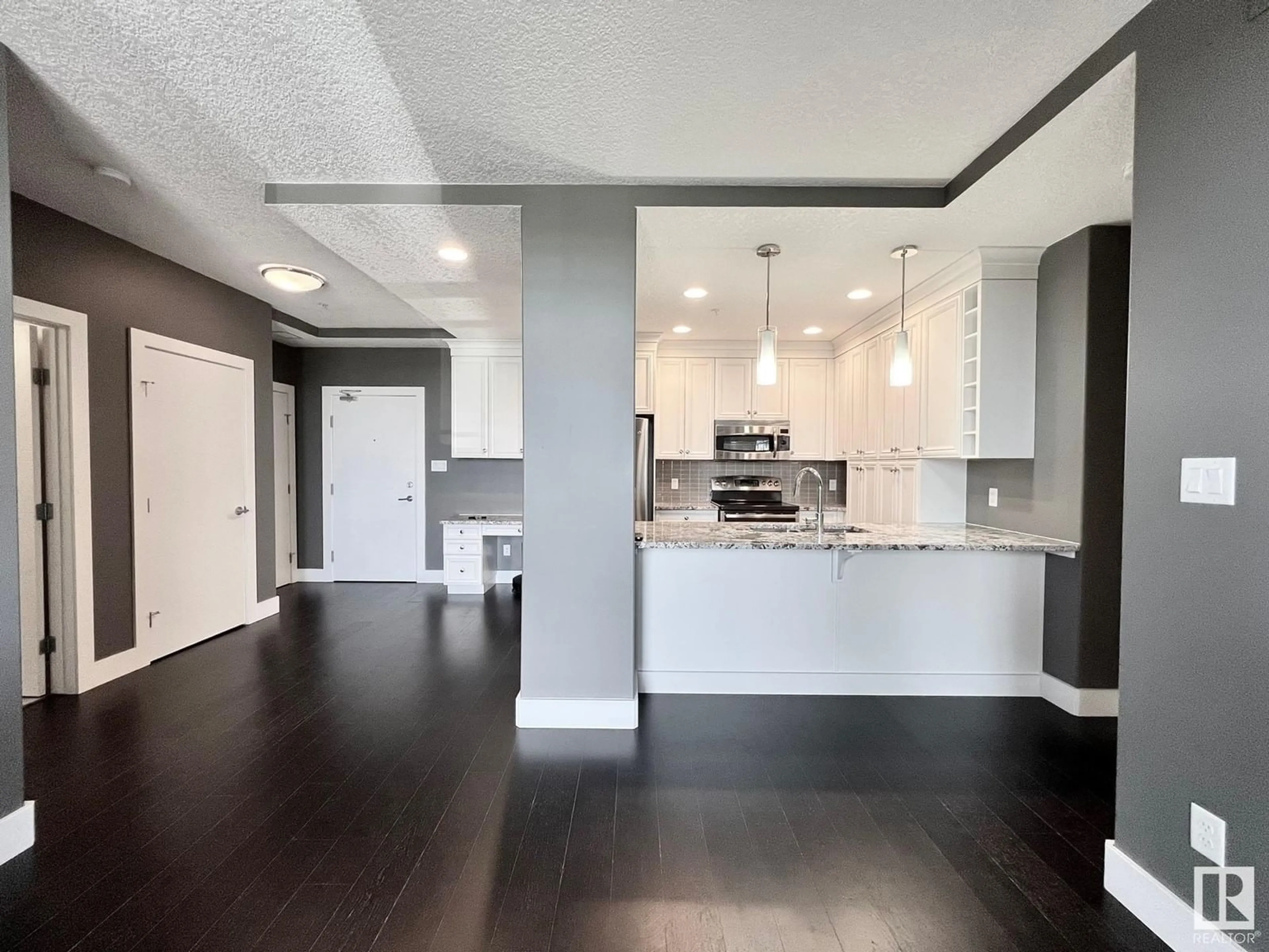 Open concept kitchen for #312 11080 ELLERSLIE RD SW, Edmonton Alberta T6W2C2