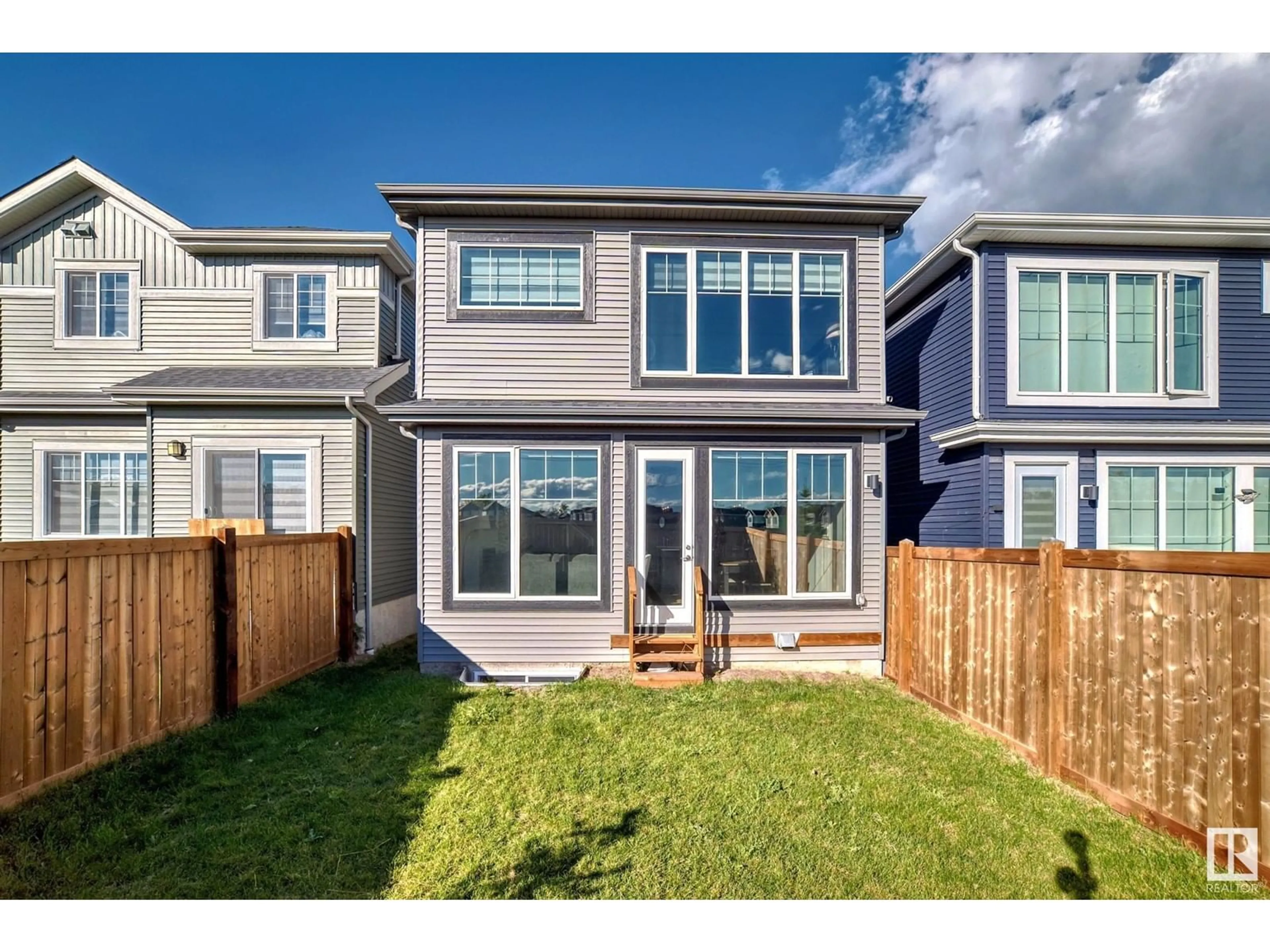 Frontside or backside of a home, the fenced backyard for 1087 EATON RD NW, Edmonton Alberta T6M1M9