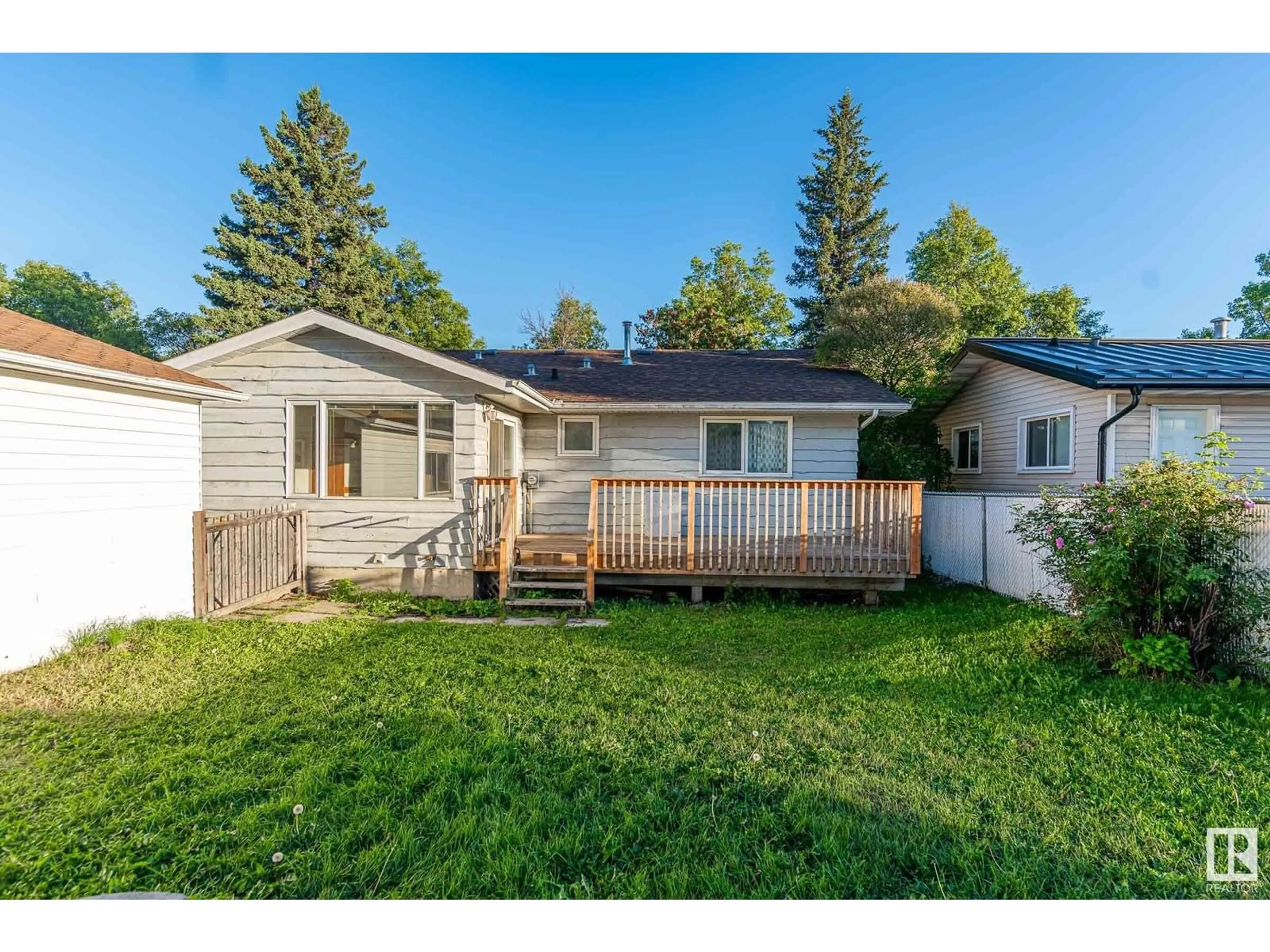 Frontside or backside of a home, the fenced backyard for 47 LINWOOD CR, St. Albert Alberta T8N1P6