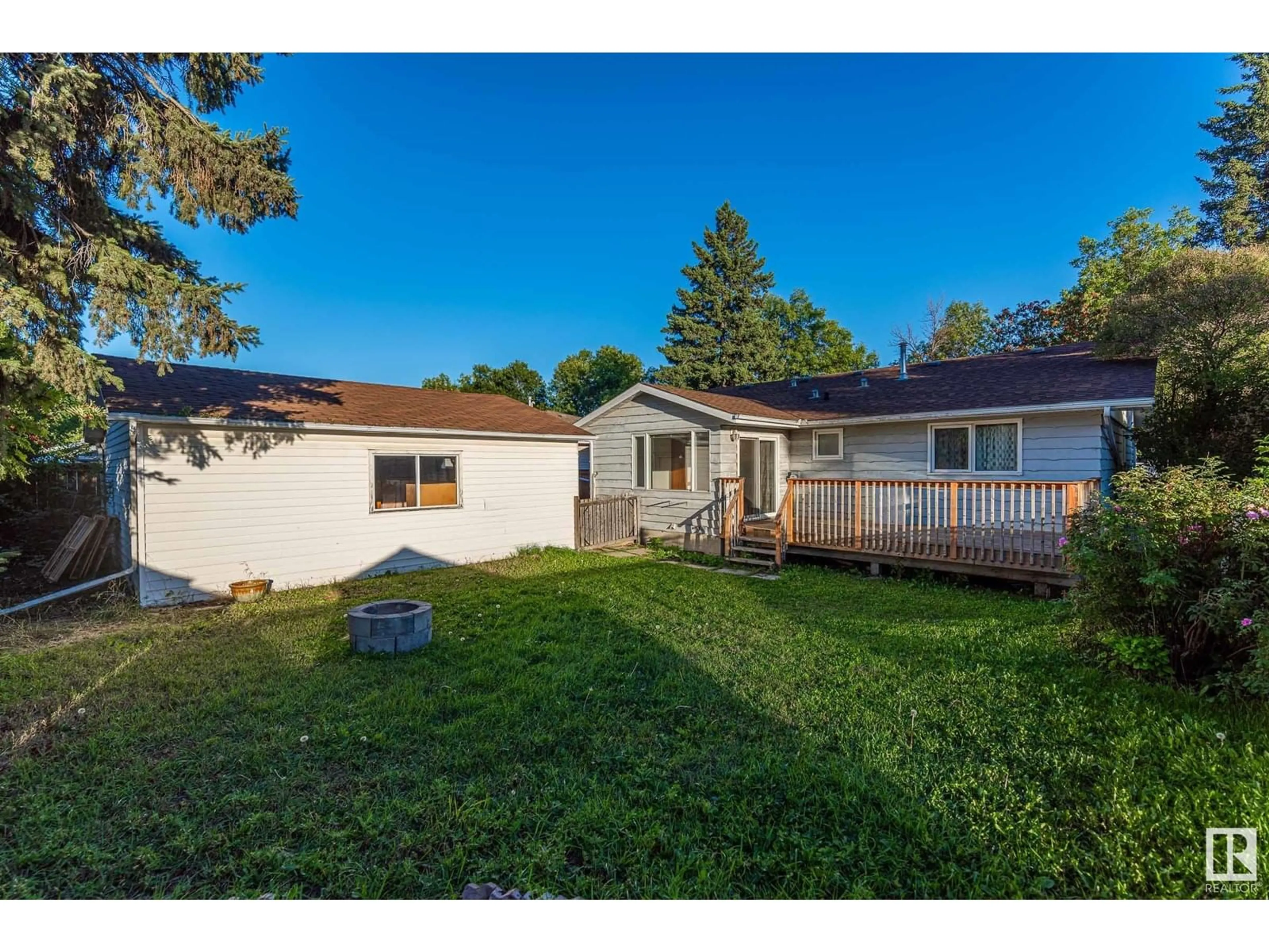 Frontside or backside of a home, the fenced backyard for 47 LINWOOD CR, St. Albert Alberta T8N1P6