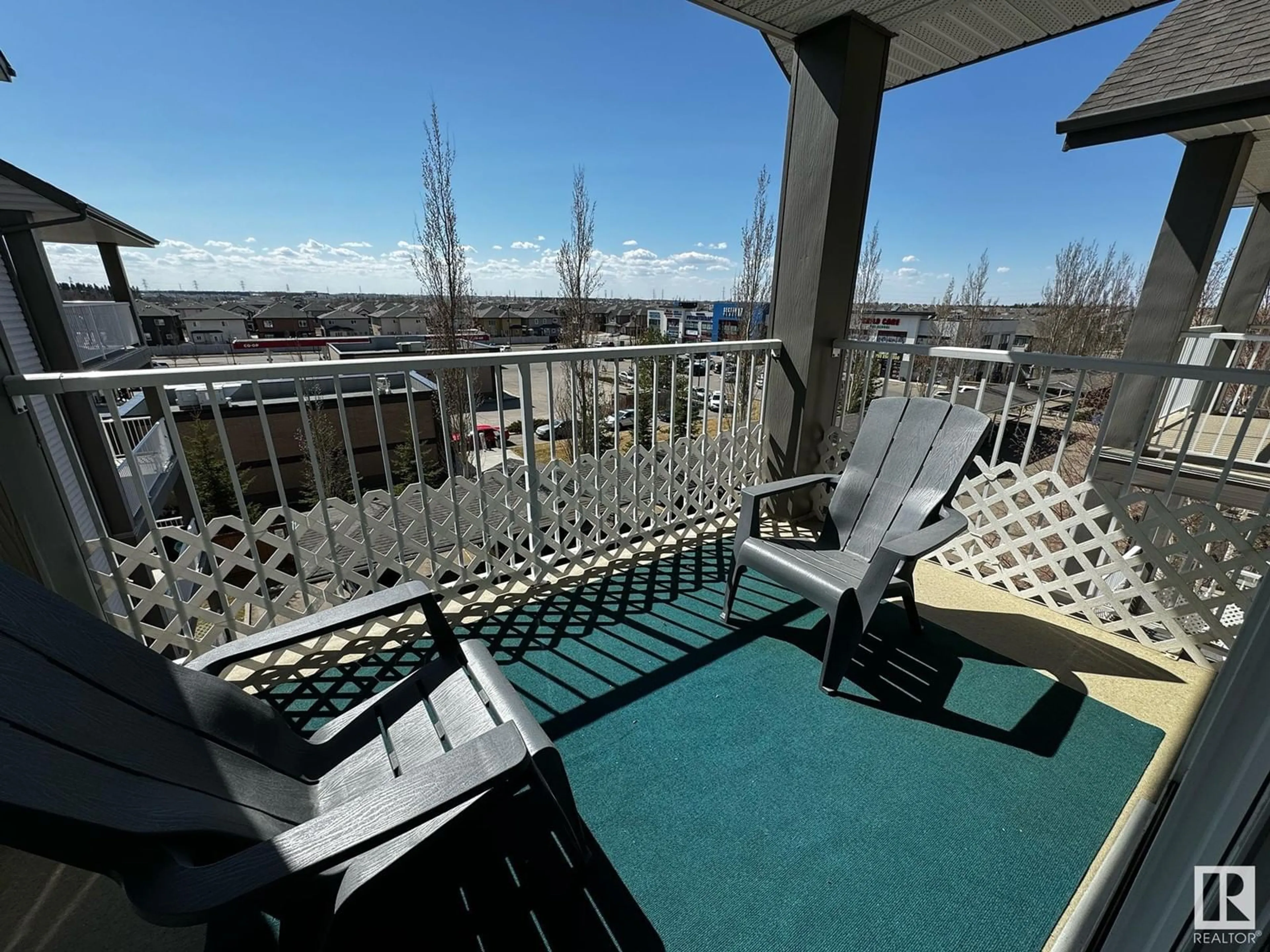 Balcony in the apartment, the fenced backyard for #432 3425 19 ST NW, Edmonton Alberta T5T2B5