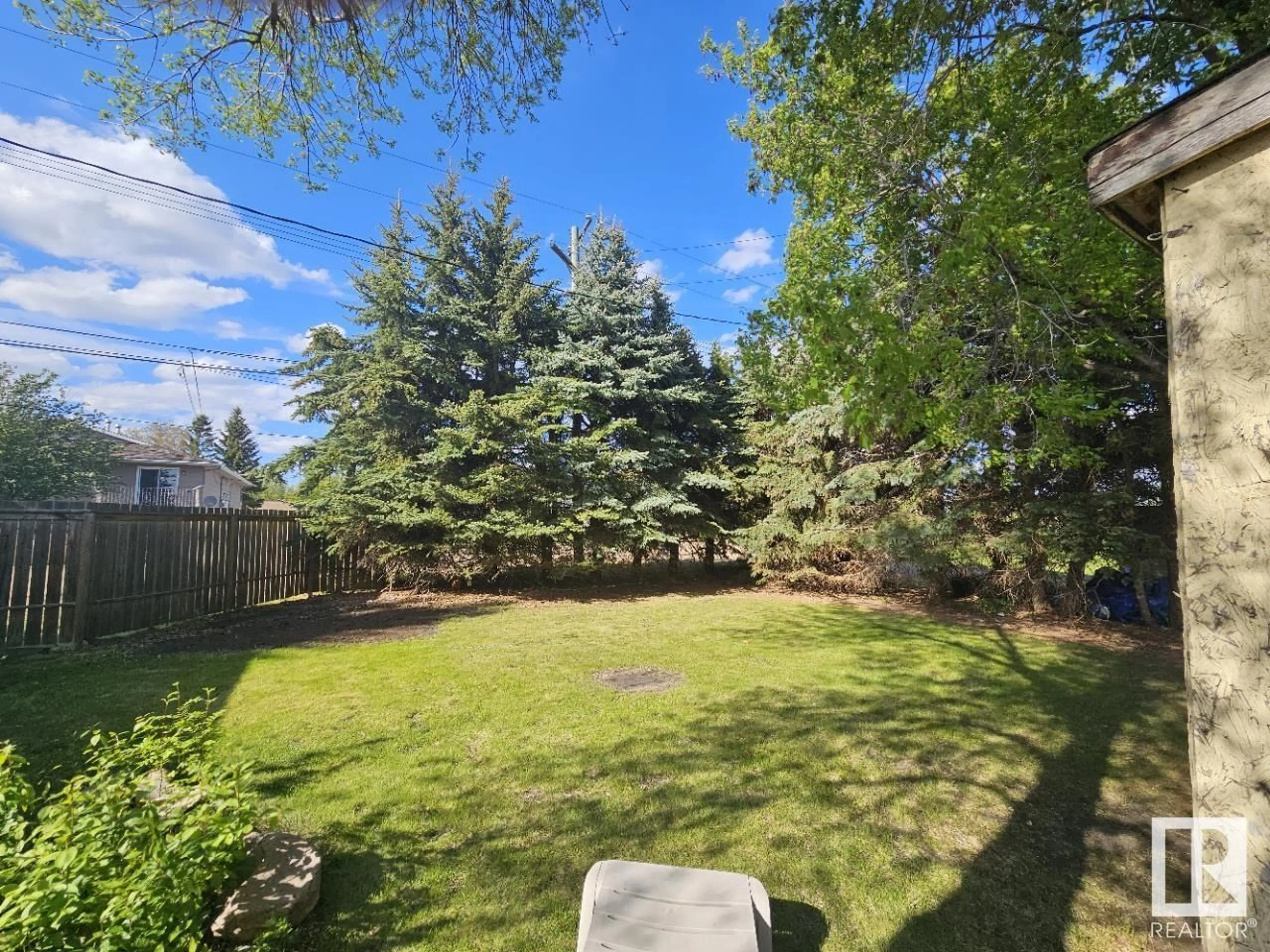 Patio, the fenced backyard for 4907 44 ST, Two Hills Alberta T0B4K0