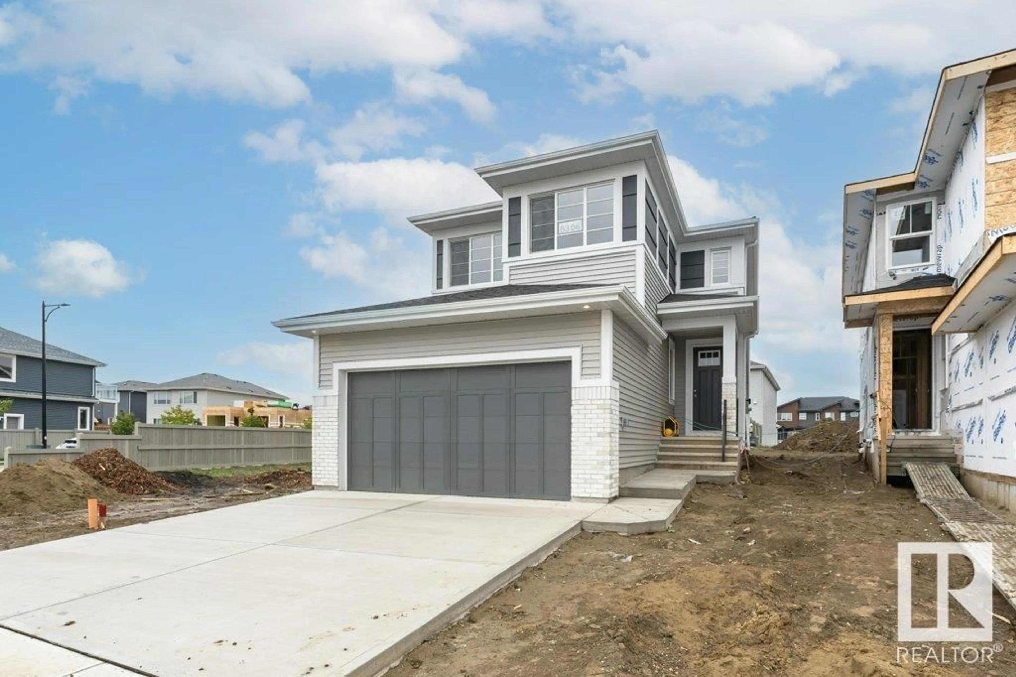 Frontside or backside of a home, the street view for 6306 DANSEREAU CR, Beaumont Alberta T4X2Y6