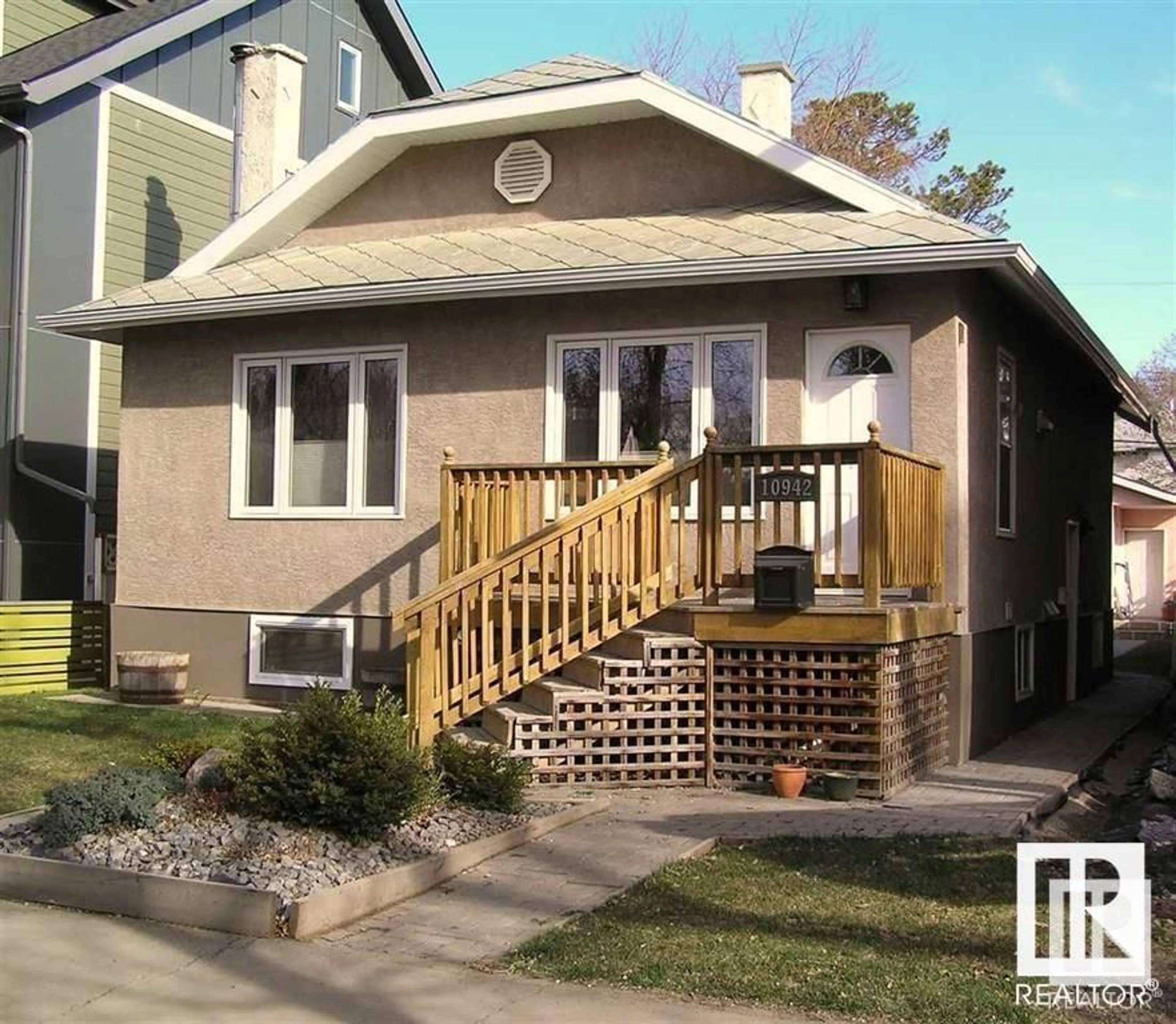 Frontside or backside of a home, cottage for 10942 80 AV NW, Edmonton Alberta T6G0R1