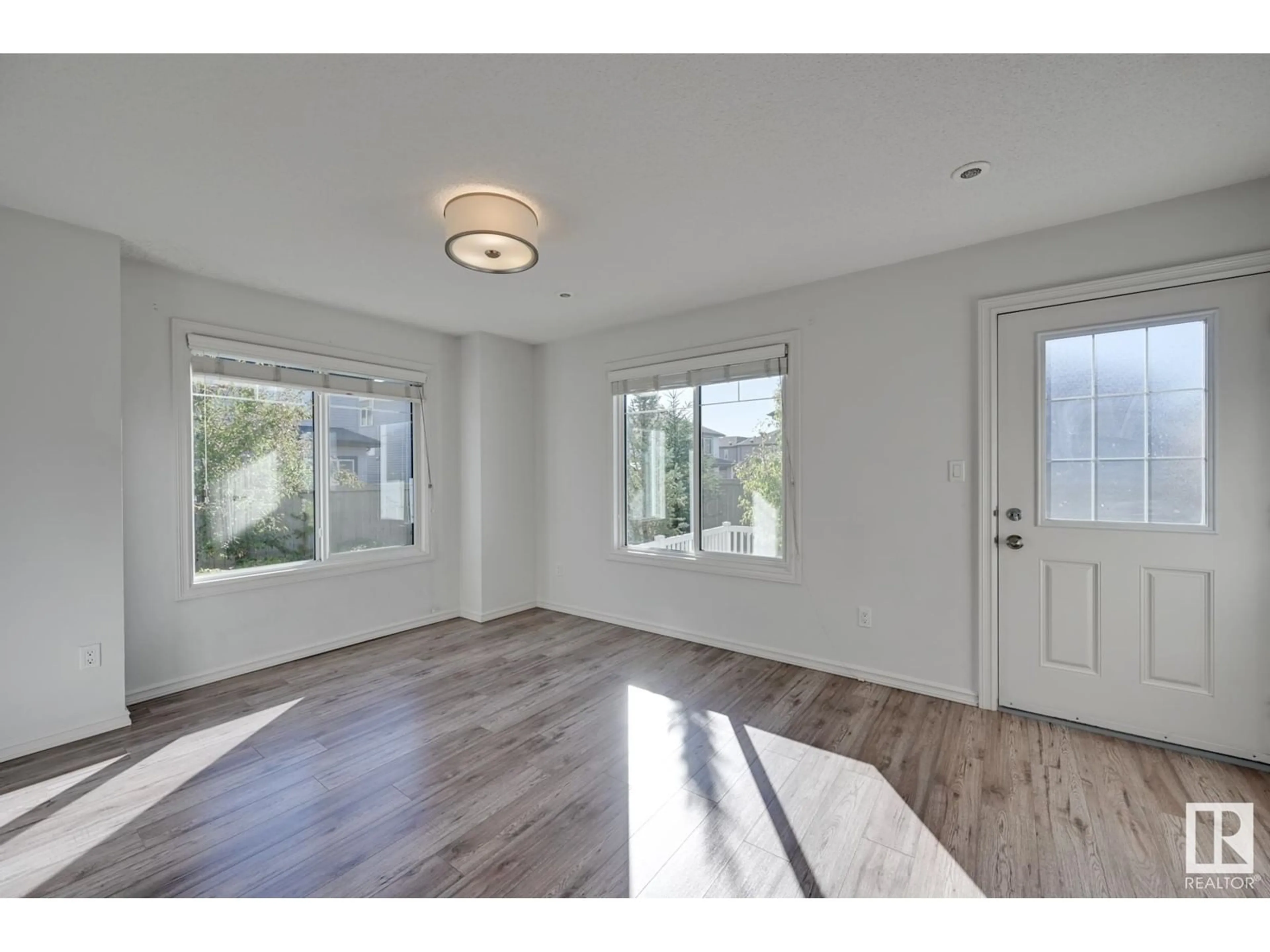 A pic of a room, wood floors for #25 2215 24 ST NW, Edmonton Alberta T6T1A6