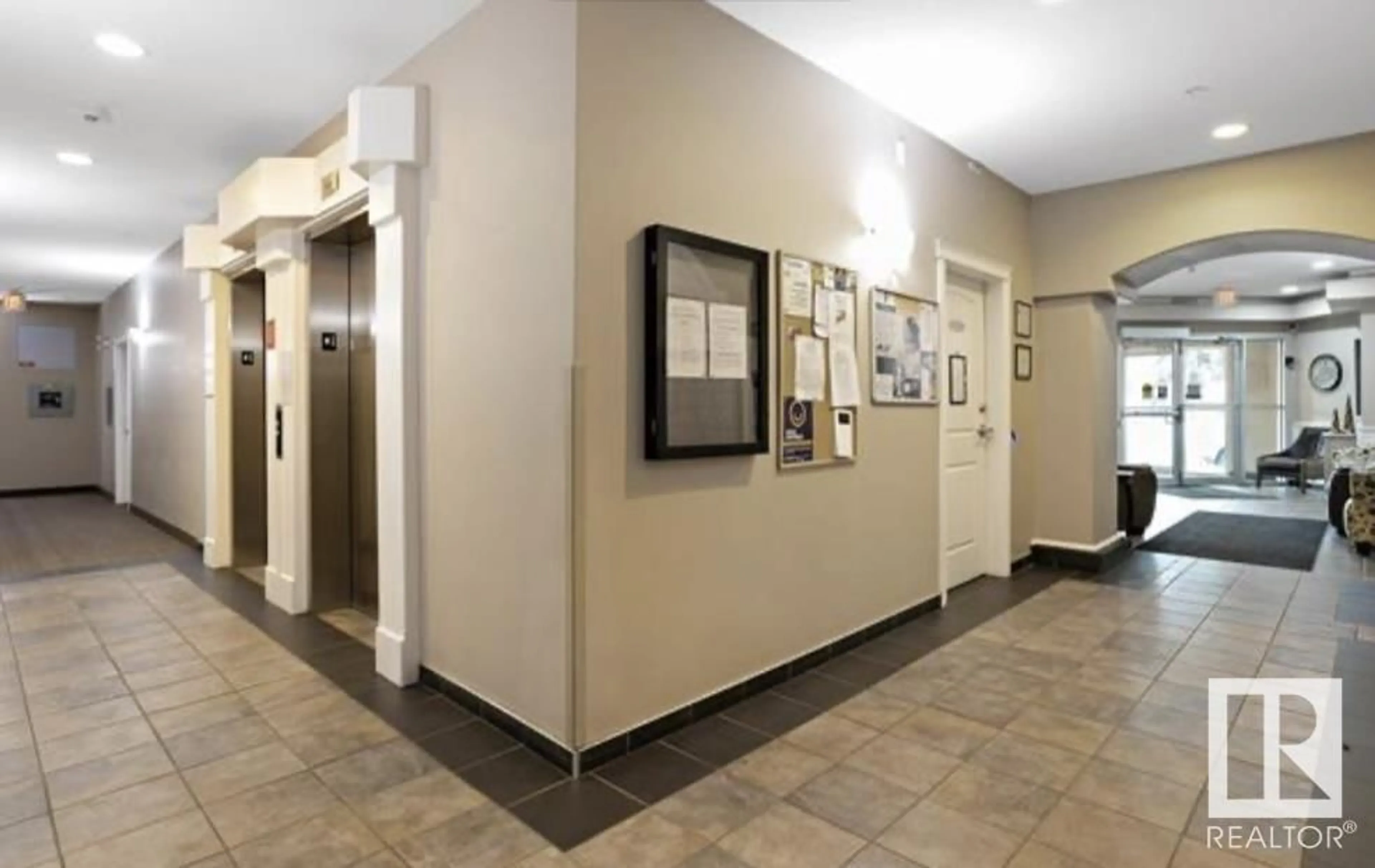 Indoor foyer, ceramic floors for #229 8528 82 AV NW, Edmonton Alberta T6C0Y8