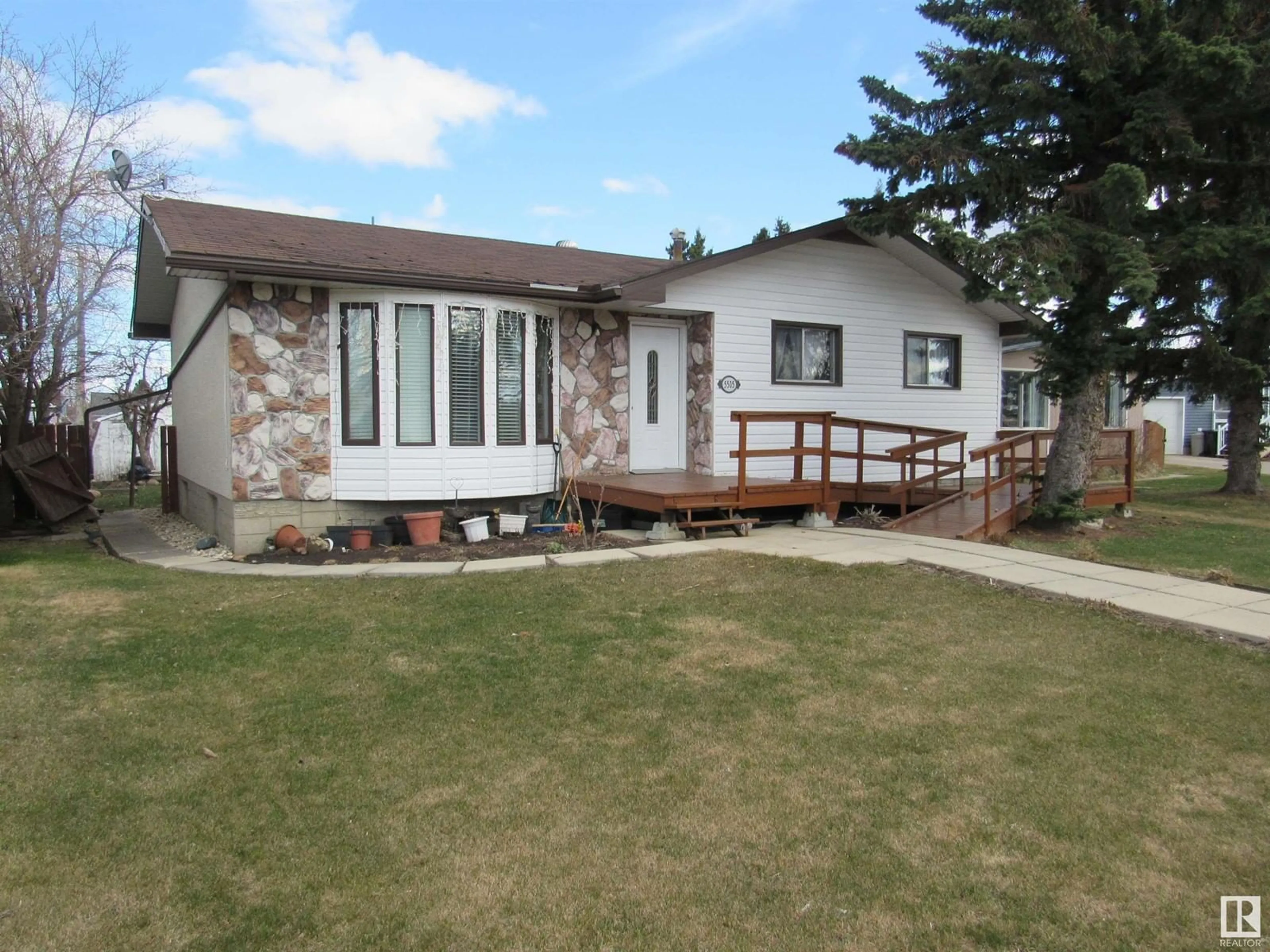 Frontside or backside of a home for 5505 56 ST, Barrhead Alberta T7N1C6