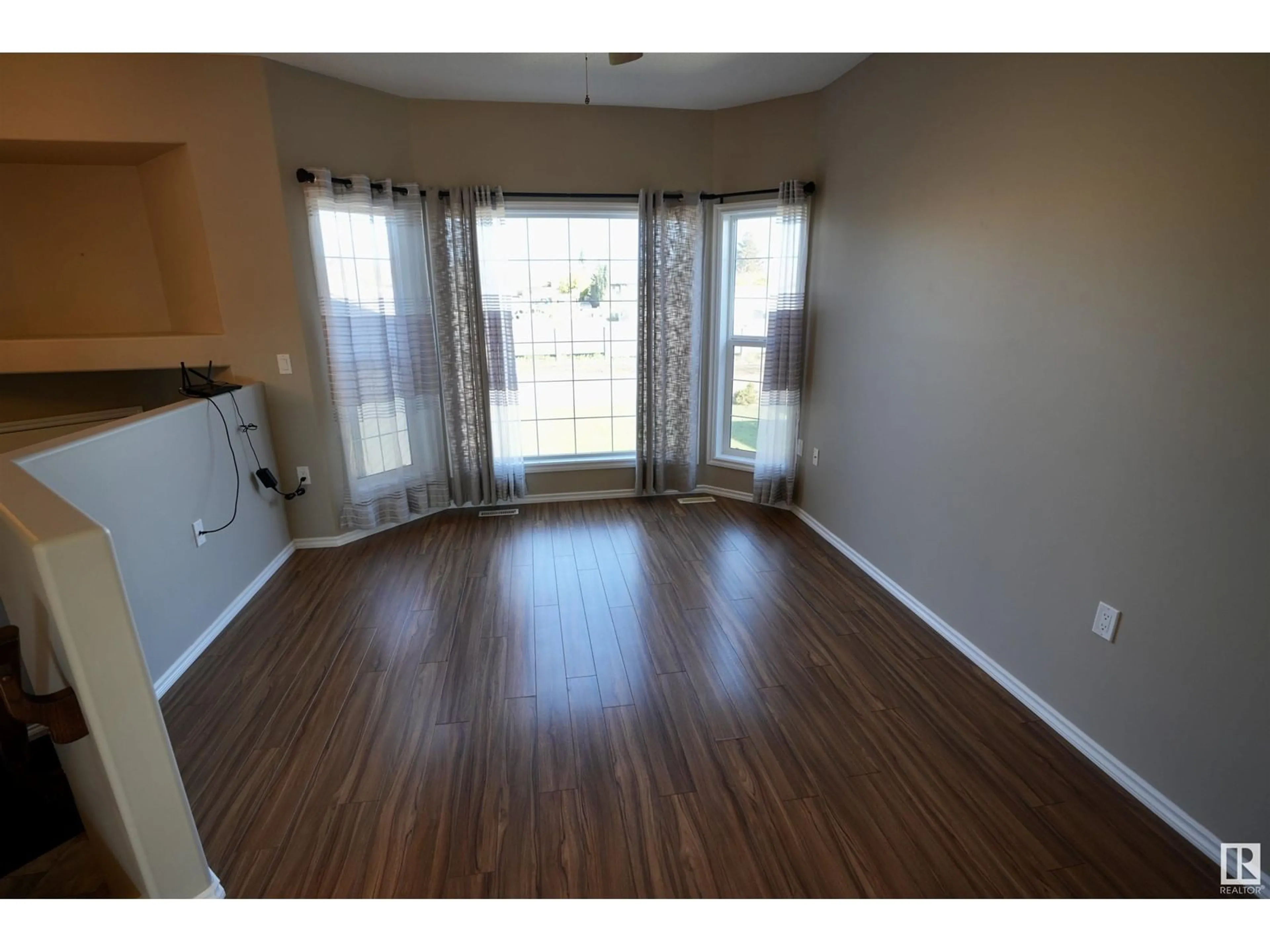 A pic of a room, wood floors for 4717 43 AV, St. Paul Town Alberta T0A3A3