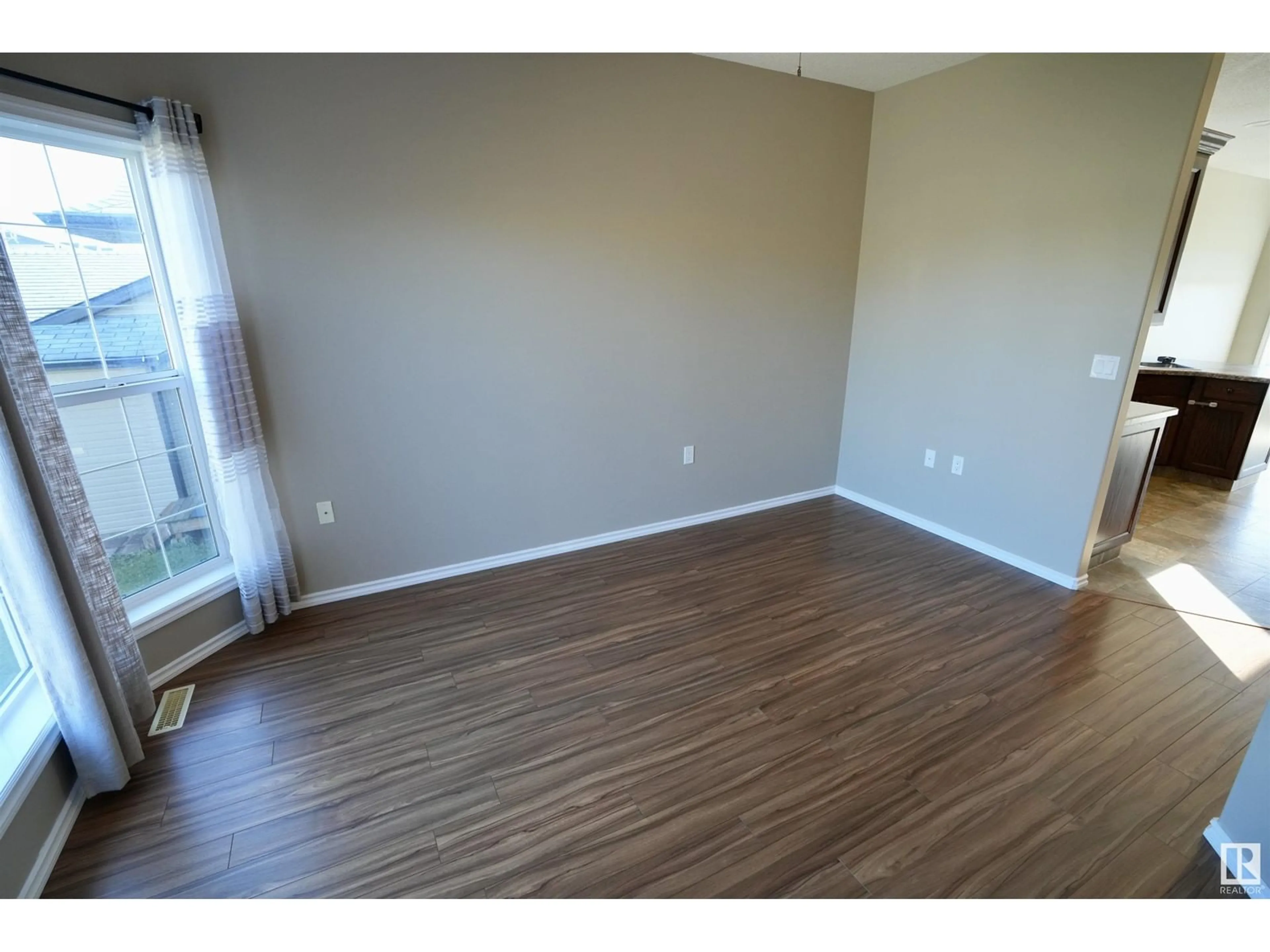 A pic of a room, wood floors for 4717 43 AV, St. Paul Town Alberta T0A3A3