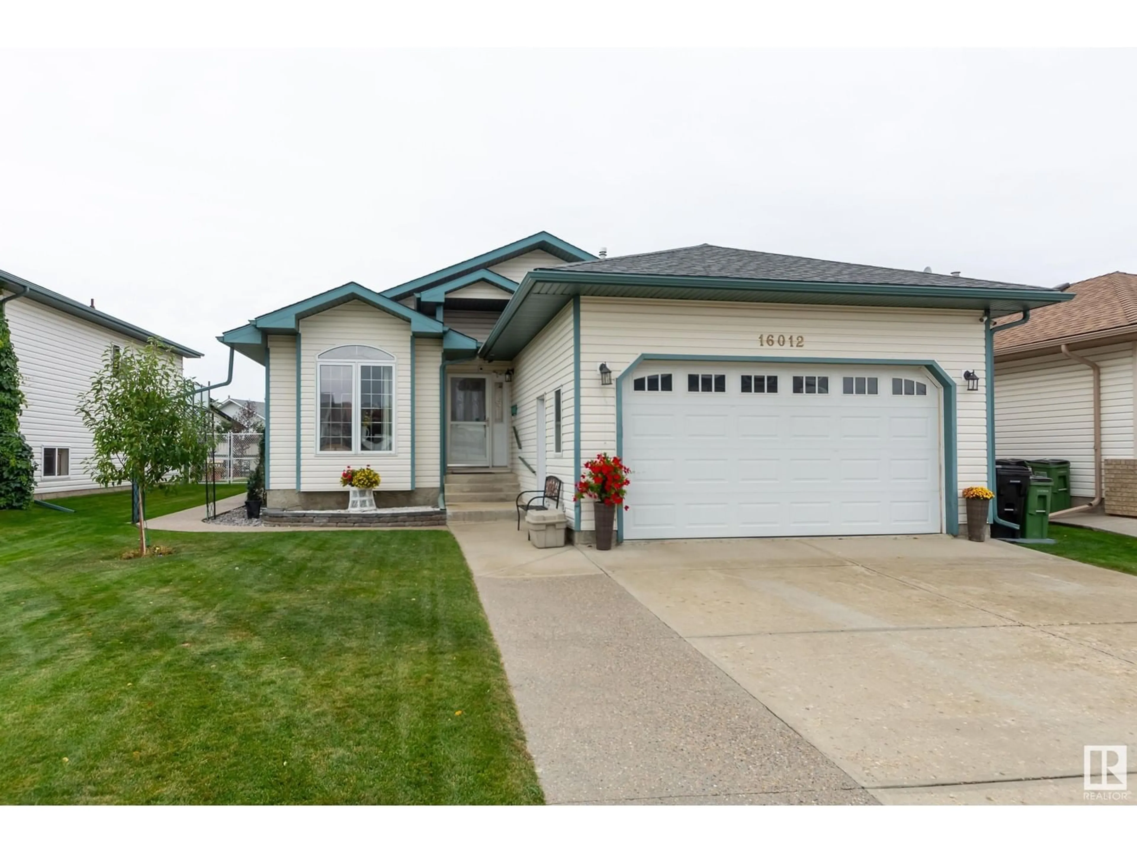 Frontside or backside of a home, the street view for 16012 78 ST NW, Edmonton Alberta T5Z3E9