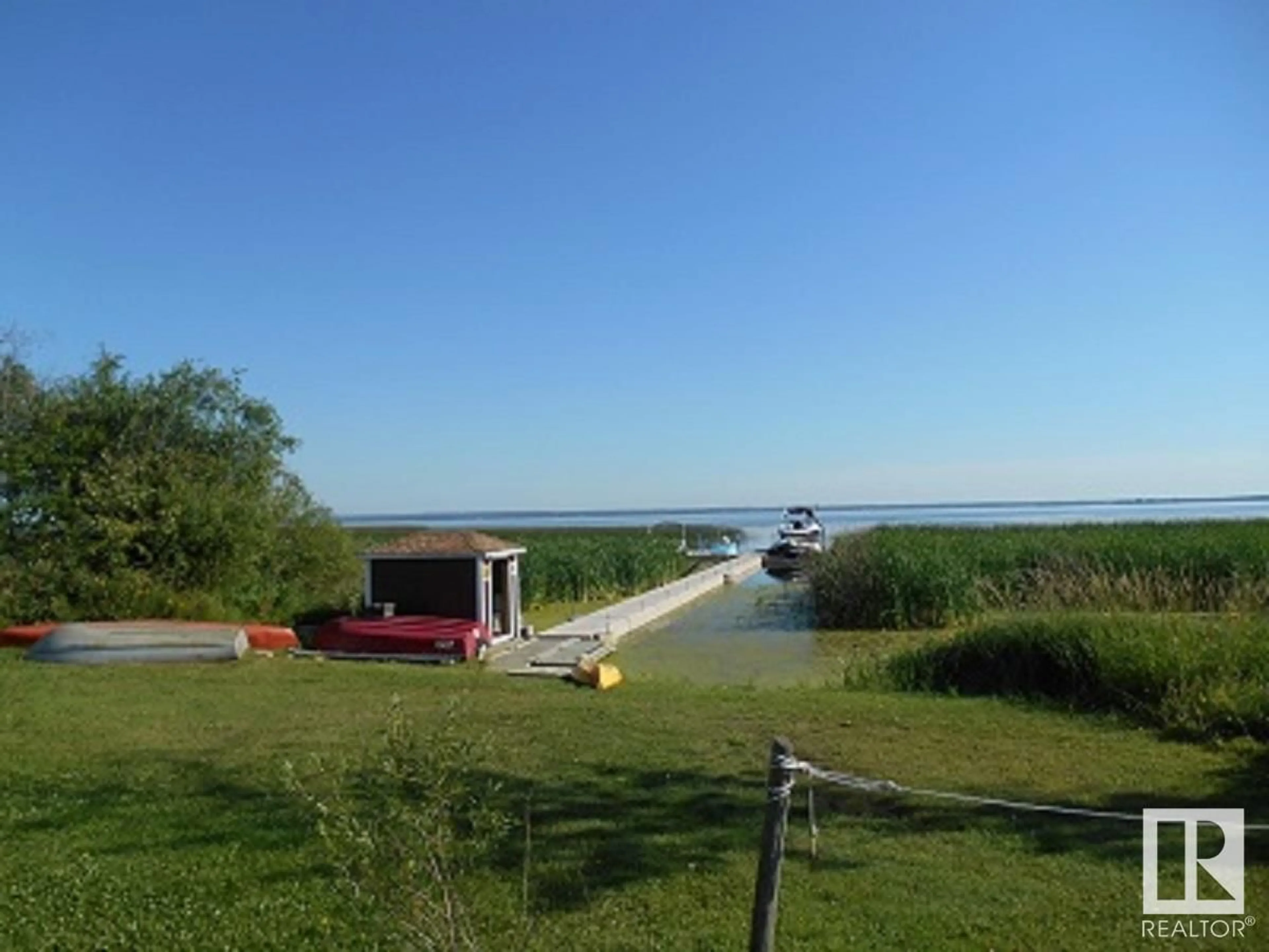 A pic from exterior of the house or condo, lake for #4 3401 Ste. Anne Trail, Rural Lac Ste. Anne County Alberta T0E0A1