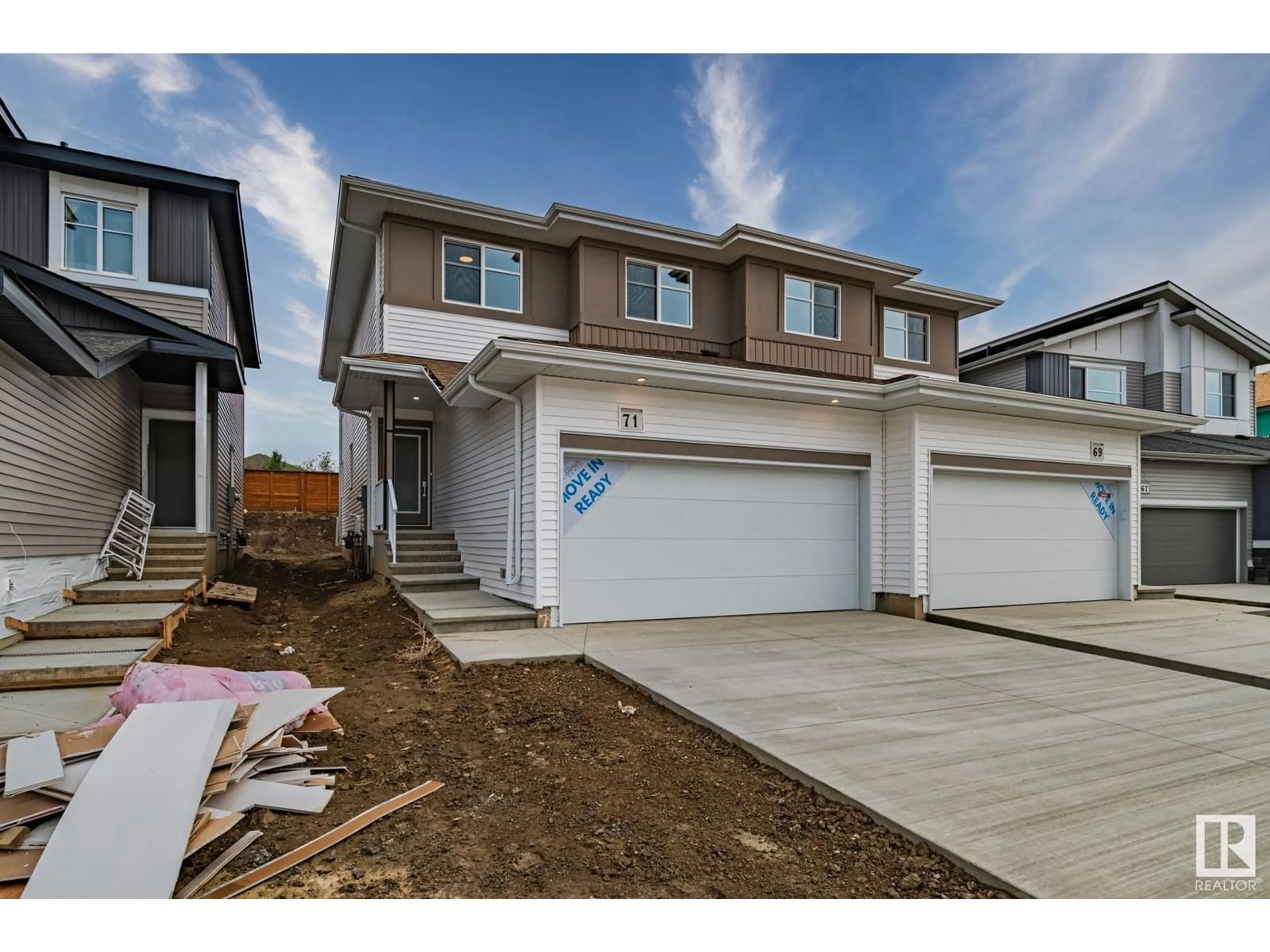 A pic from exterior of the house or condo, the fenced backyard for 71 Rosewood WY NW, St. Albert Alberta T8N8B2