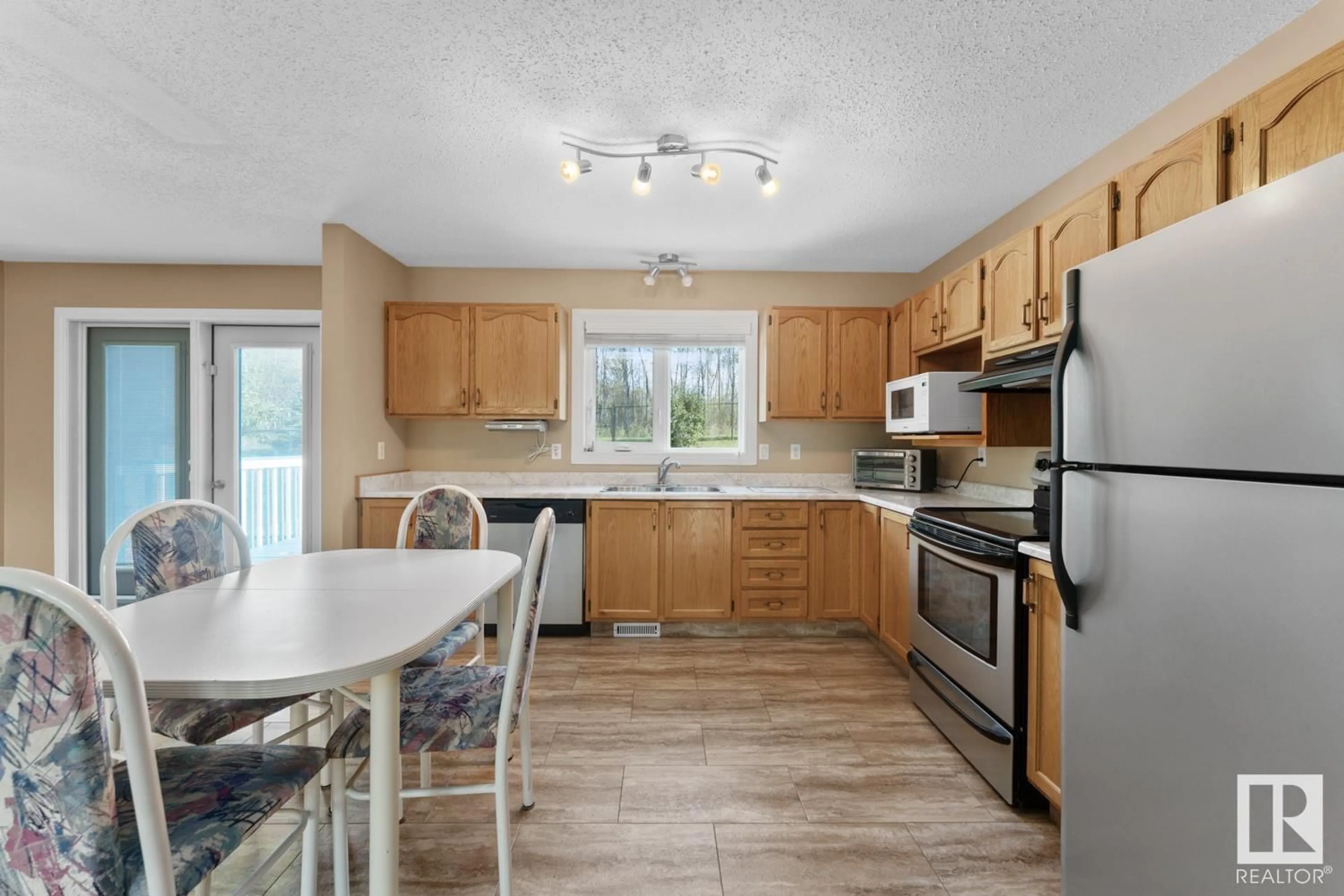 Open concept kitchen, unknown for 5105 38 ST, Cold Lake Alberta T9M2B2