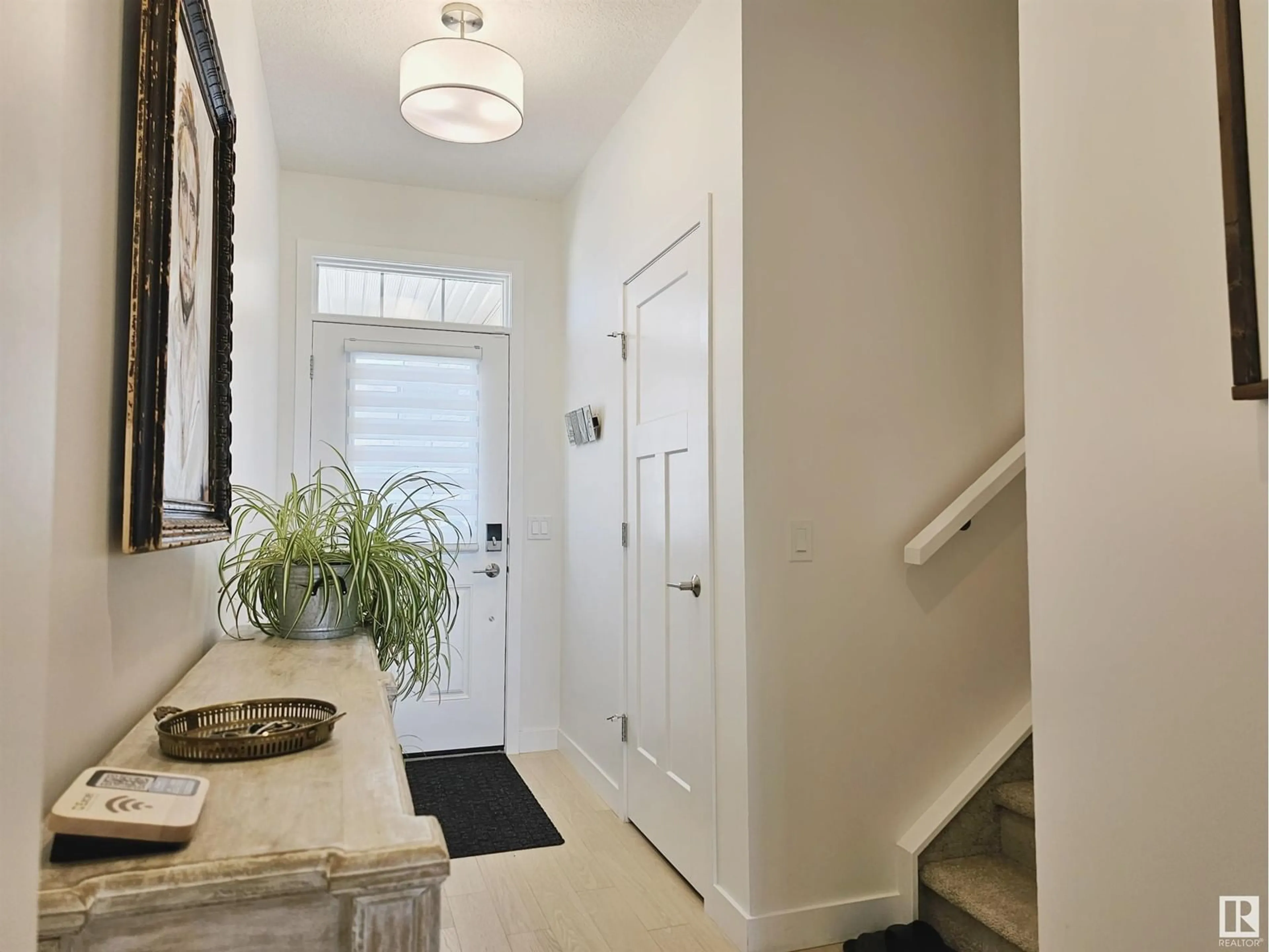 Indoor entryway, wood floors for 12812 211 ST NW, Edmonton Alberta T5S2B9