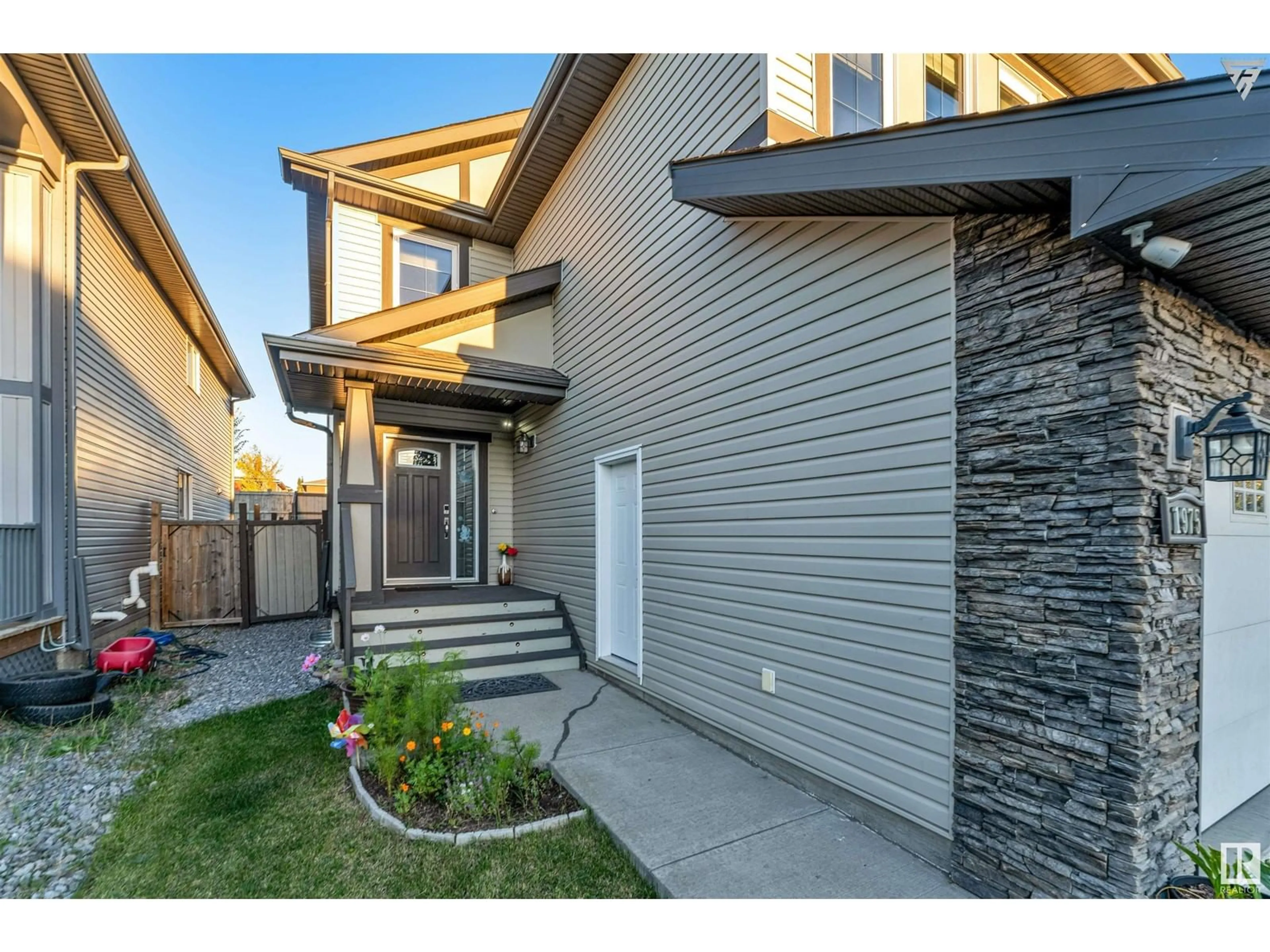 Frontside or backside of a home, the fenced backyard for 1975 67 ST SW SW, Edmonton Alberta T6X0T4