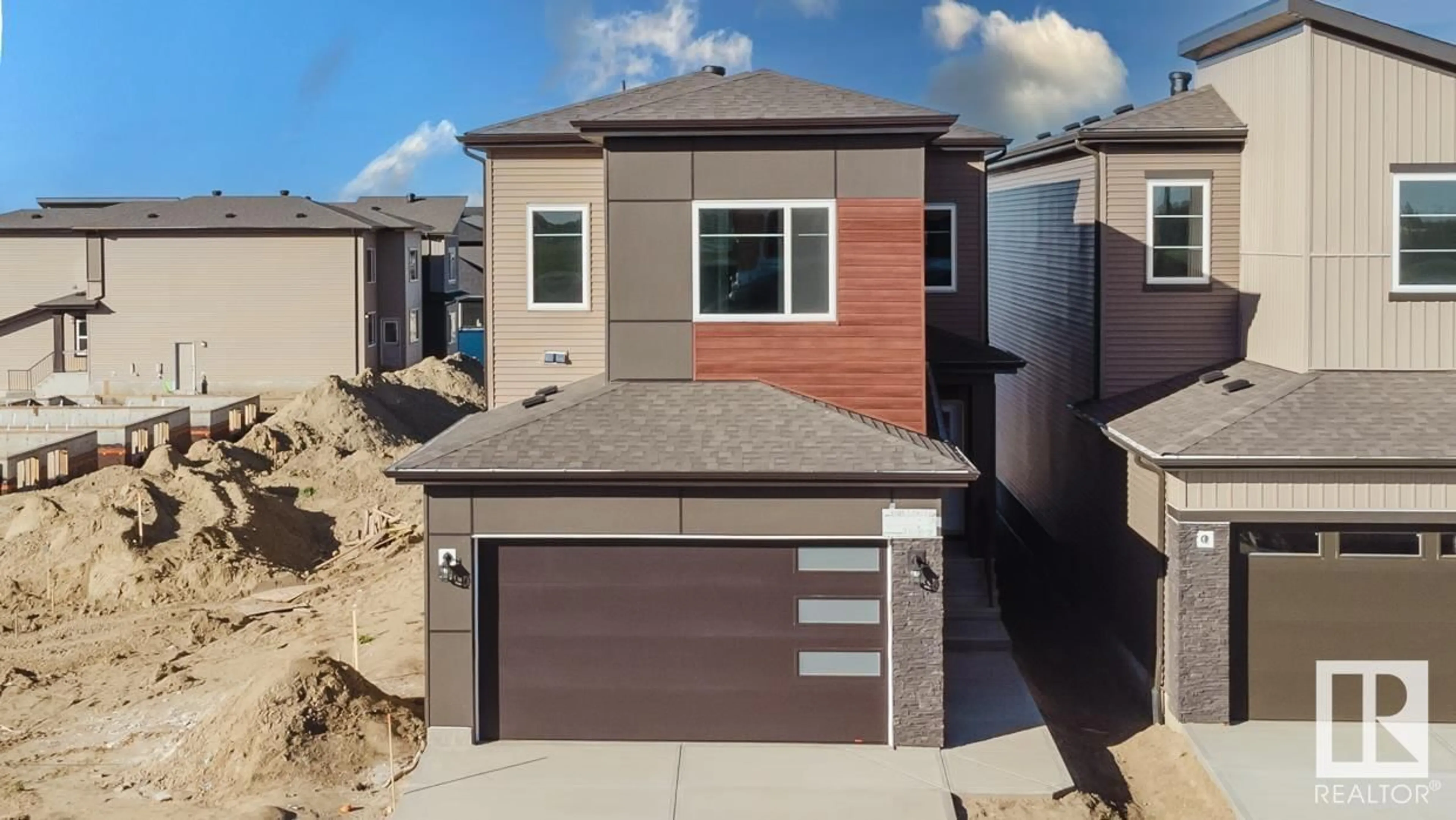 Frontside or backside of a home, the street view for 1619 SISKIN LI NW, Edmonton Alberta T5S0V2