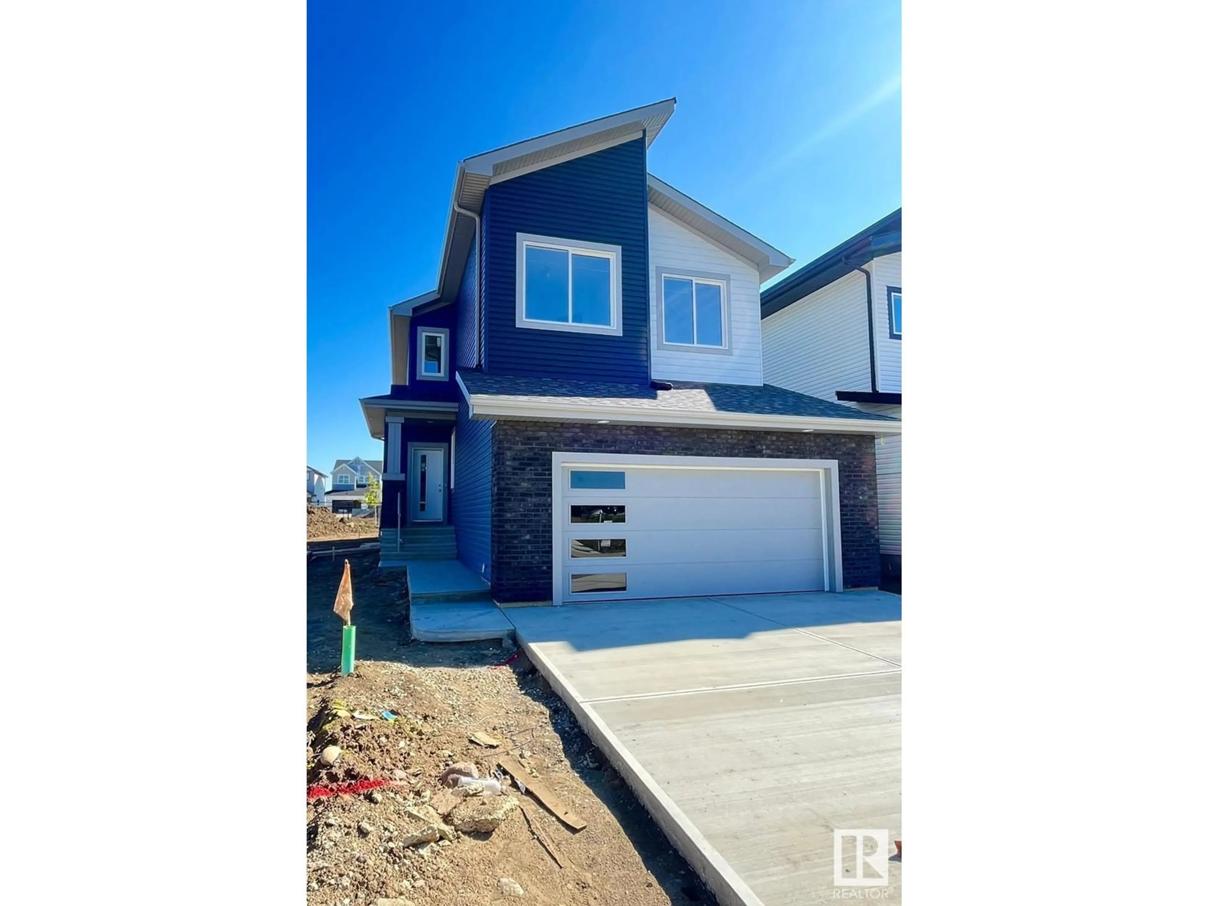 Frontside or backside of a home, the street view for 153 Rancher RD, Ardrossan Alberta T8E2E4