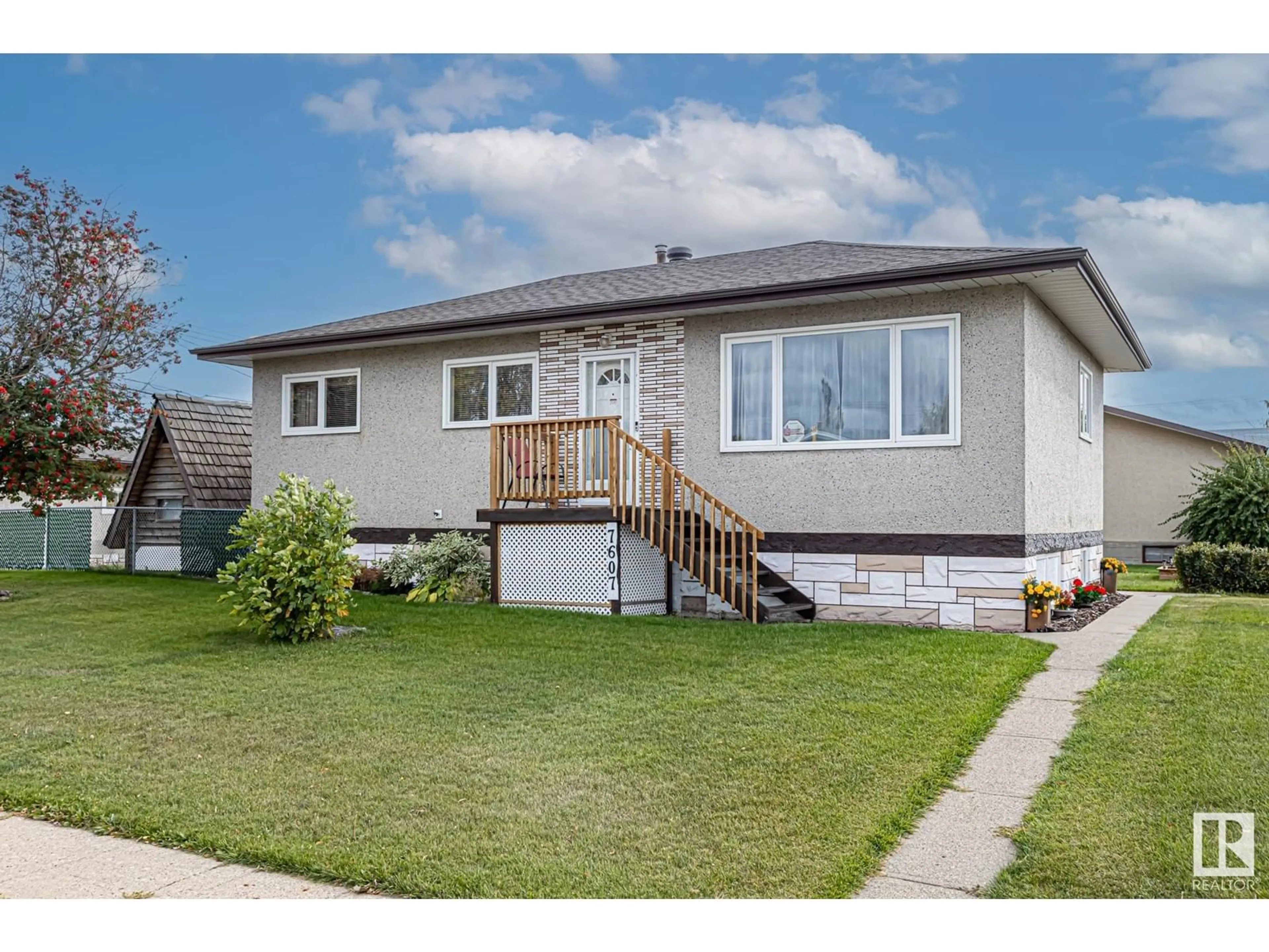 Frontside or backside of a home, cottage for 7607 128 AV NW, Edmonton Alberta T5C1T3