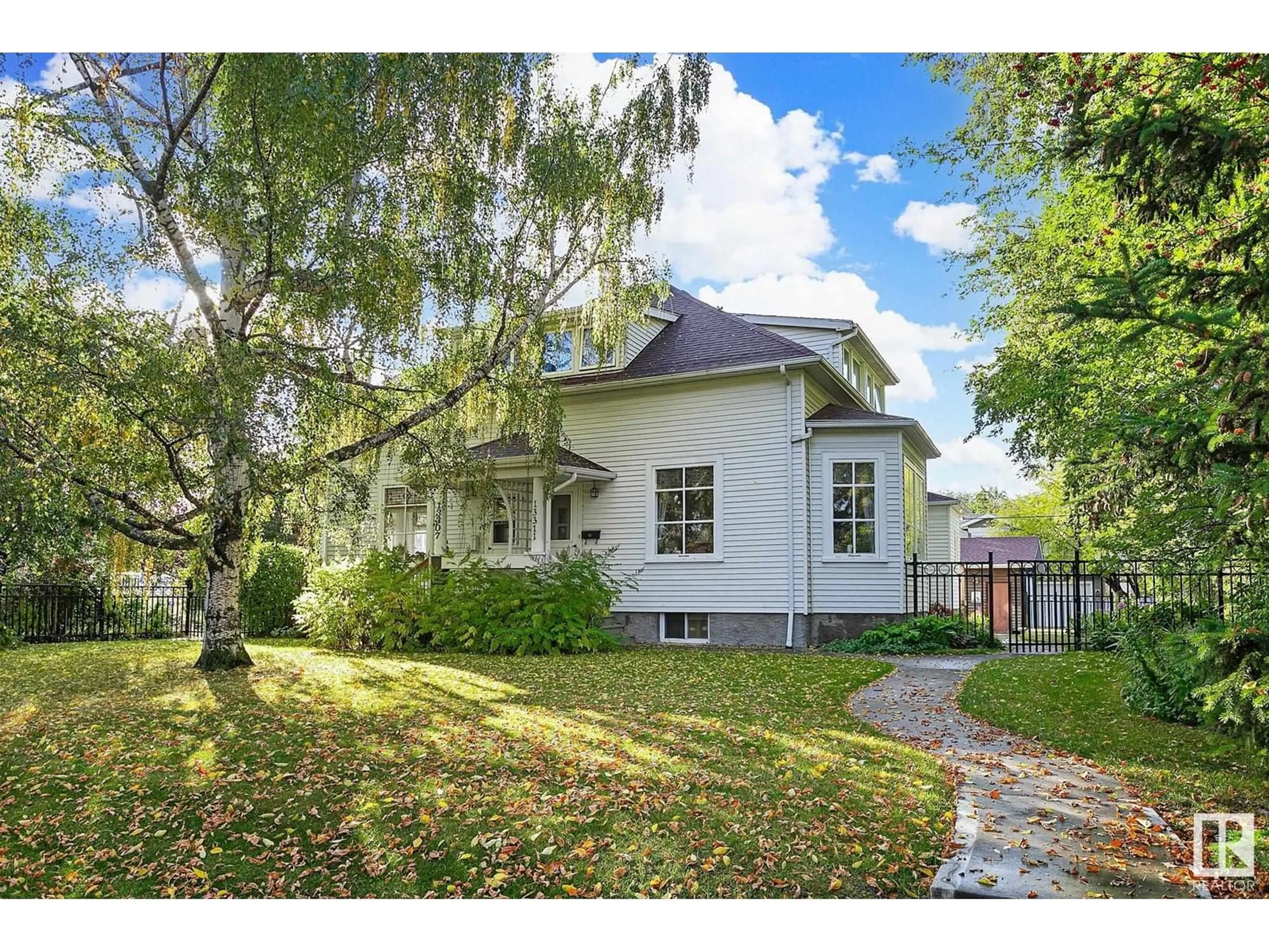 Frontside or backside of a home, cottage for 13311 124 AV NW, Edmonton Alberta T5L3A4