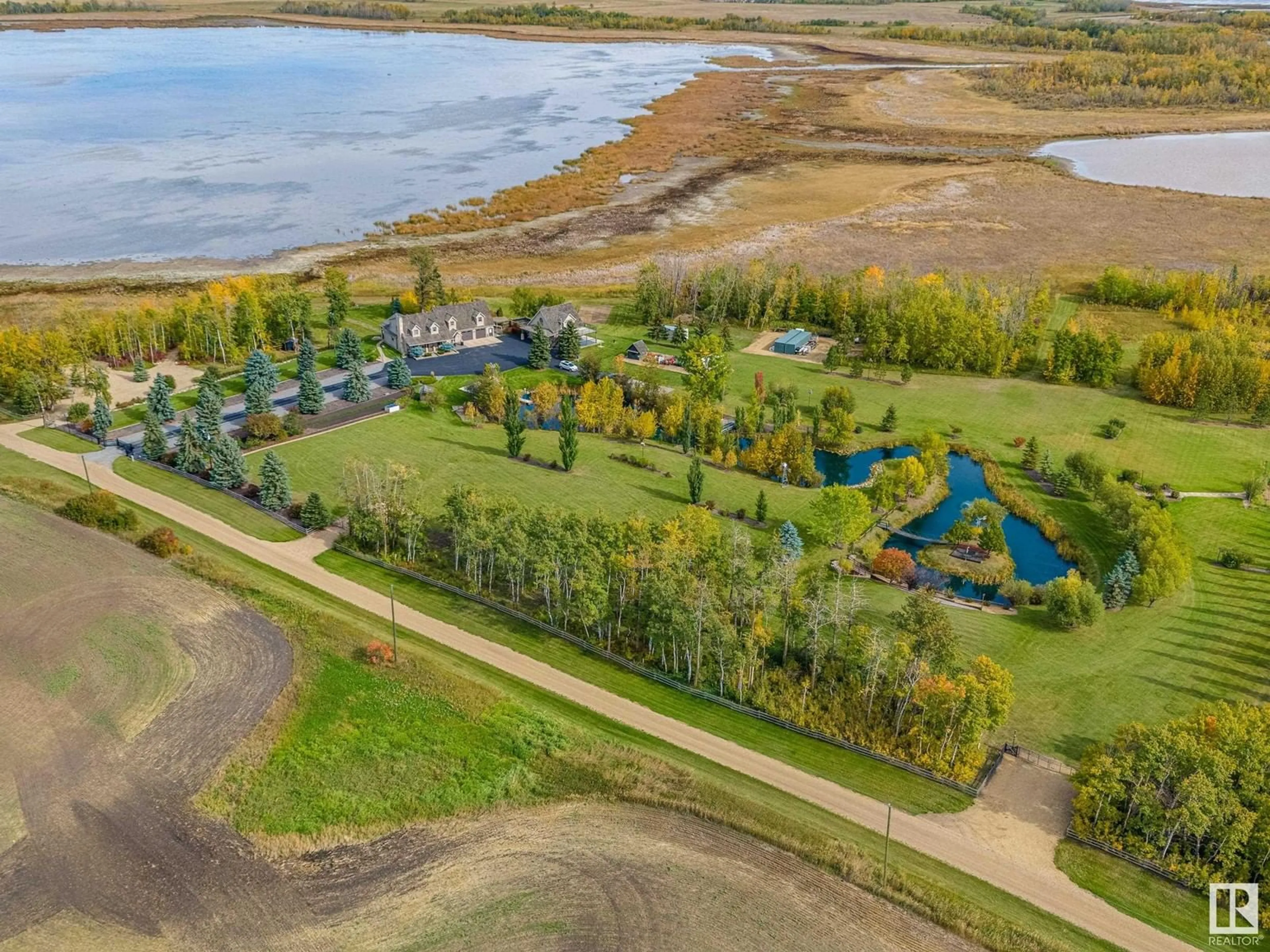 A pic from outside/outdoor area/front of a property/back of a property/a pic from drone, water/lake/river/ocean view for 40303 RANGE ROAD 222, Rural Lacombe County Alberta T0B3C0