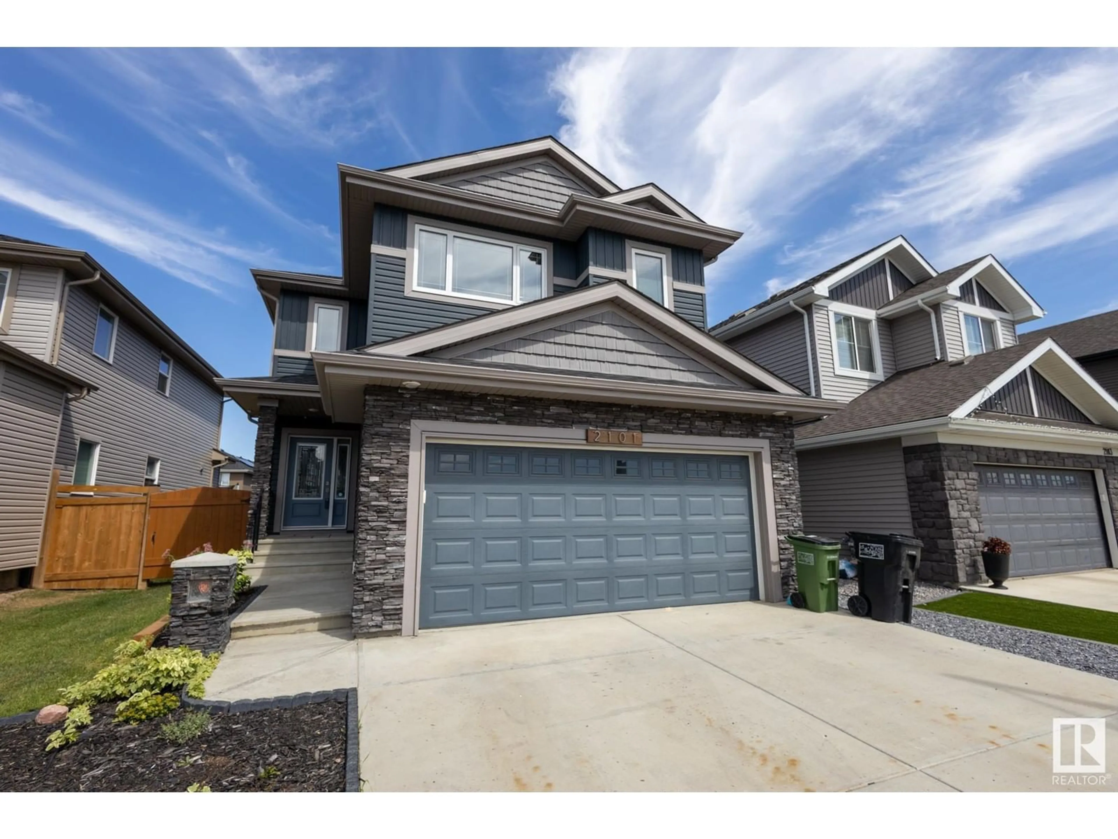 Frontside or backside of a home, the street view for 2101 WONNACOTT WY SW, Edmonton Alberta T6X2H9