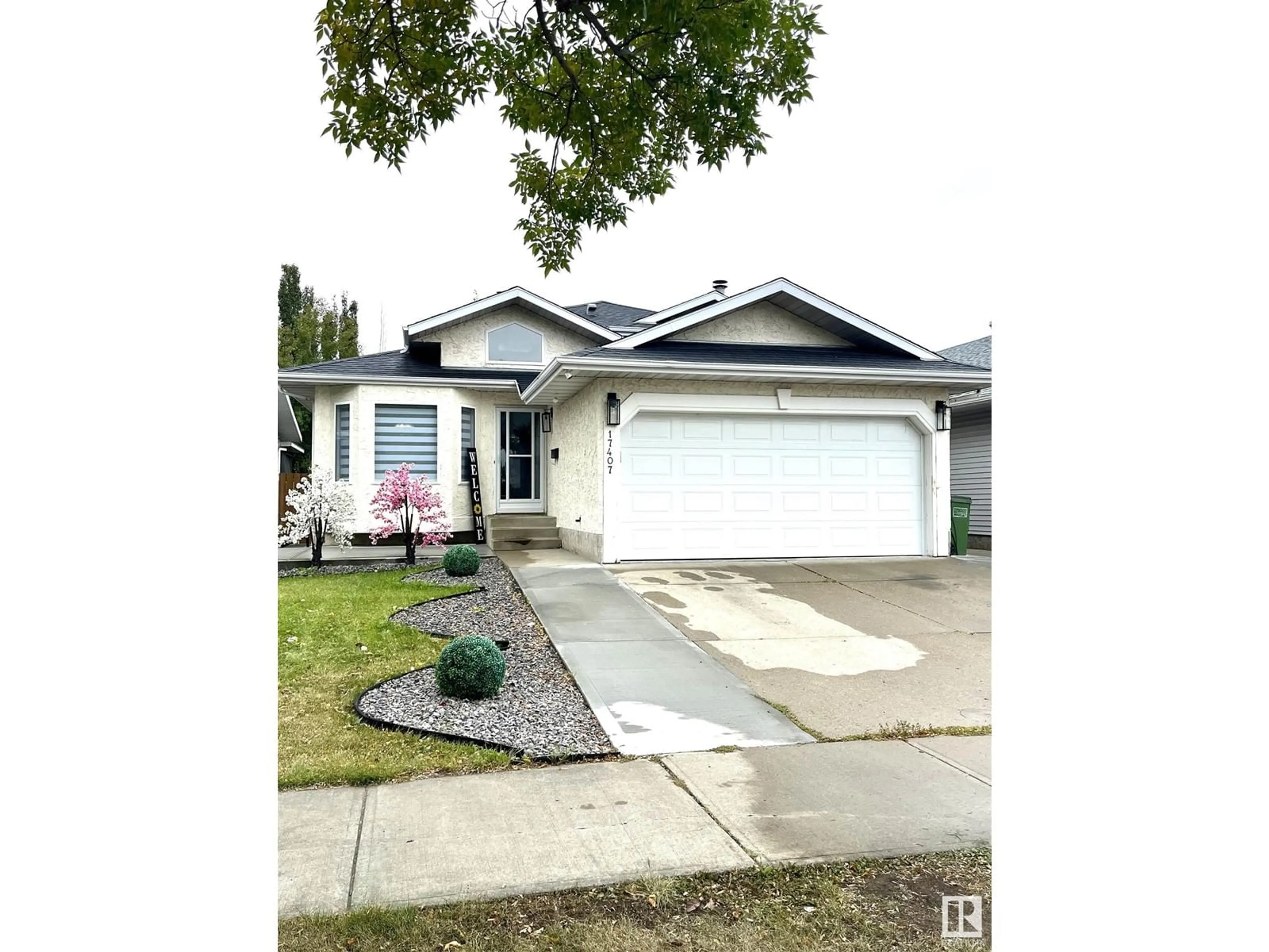 Frontside or backside of a home, the street view for 17407 91 ST NW, Edmonton Alberta T5Z2M3