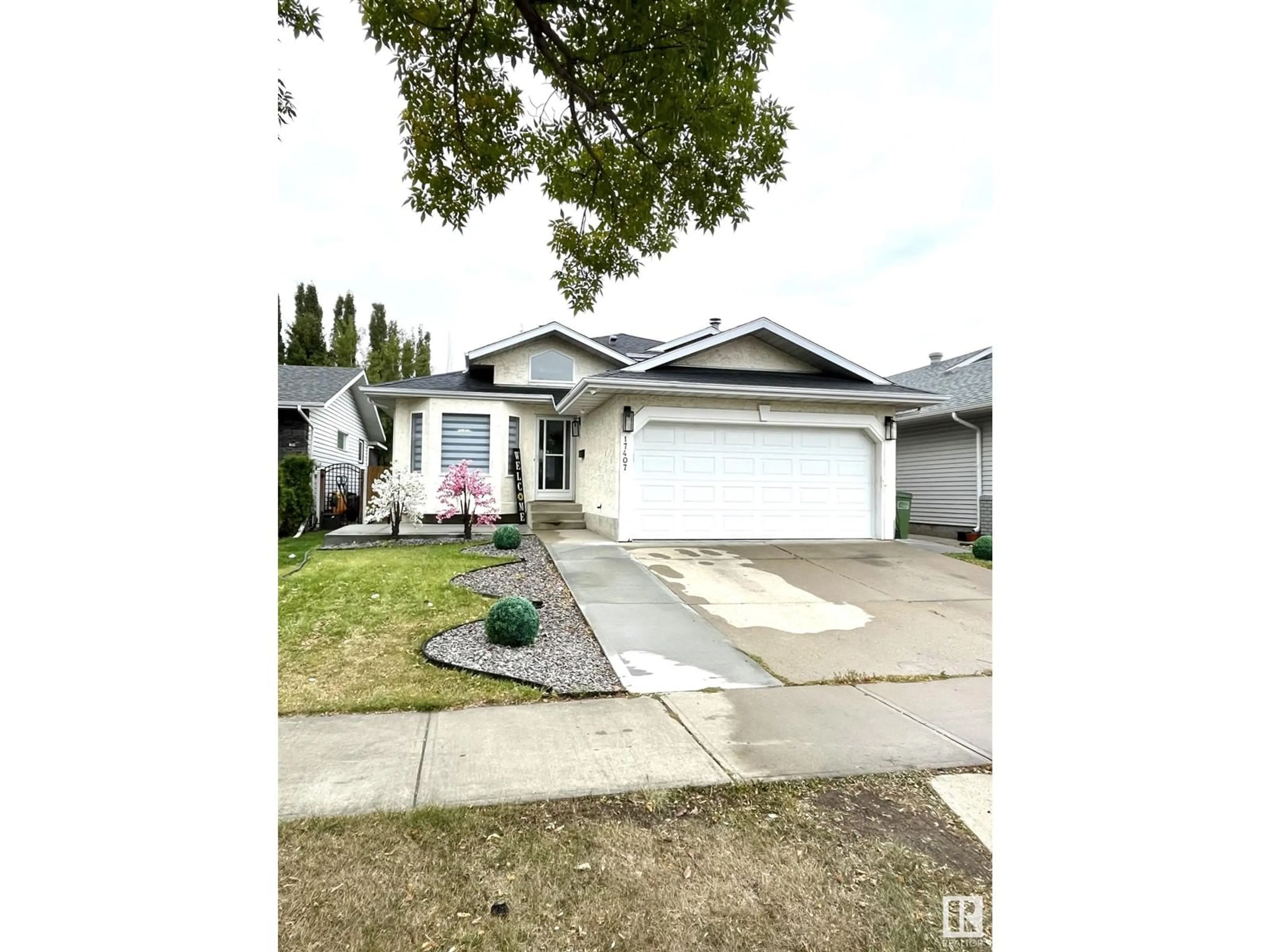 Frontside or backside of a home, the street view for 17407 91 ST NW, Edmonton Alberta T5Z2M3