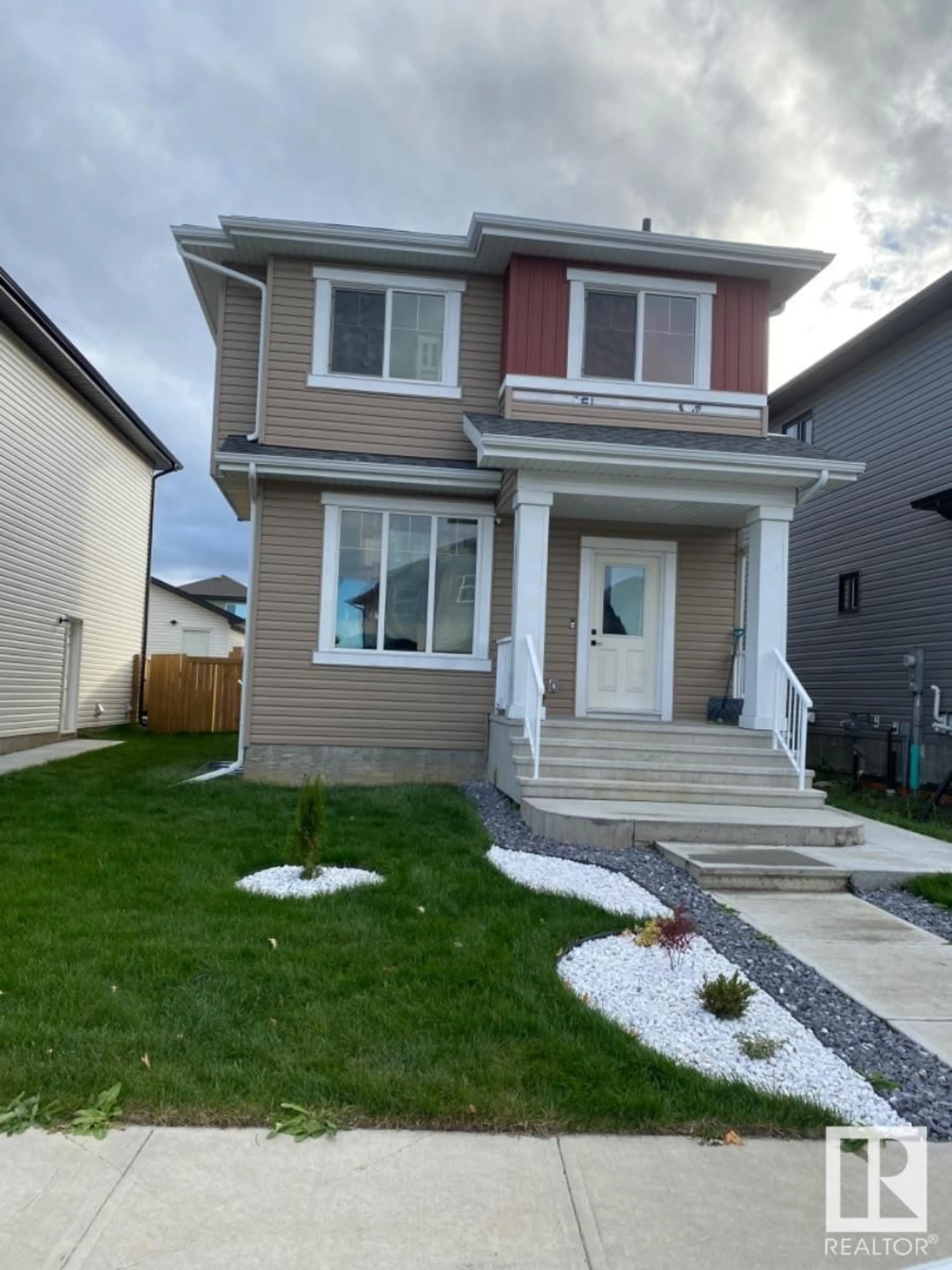 Frontside or backside of a home, the street view for 6083 180 AV NW, Edmonton Alberta T5Y3X1