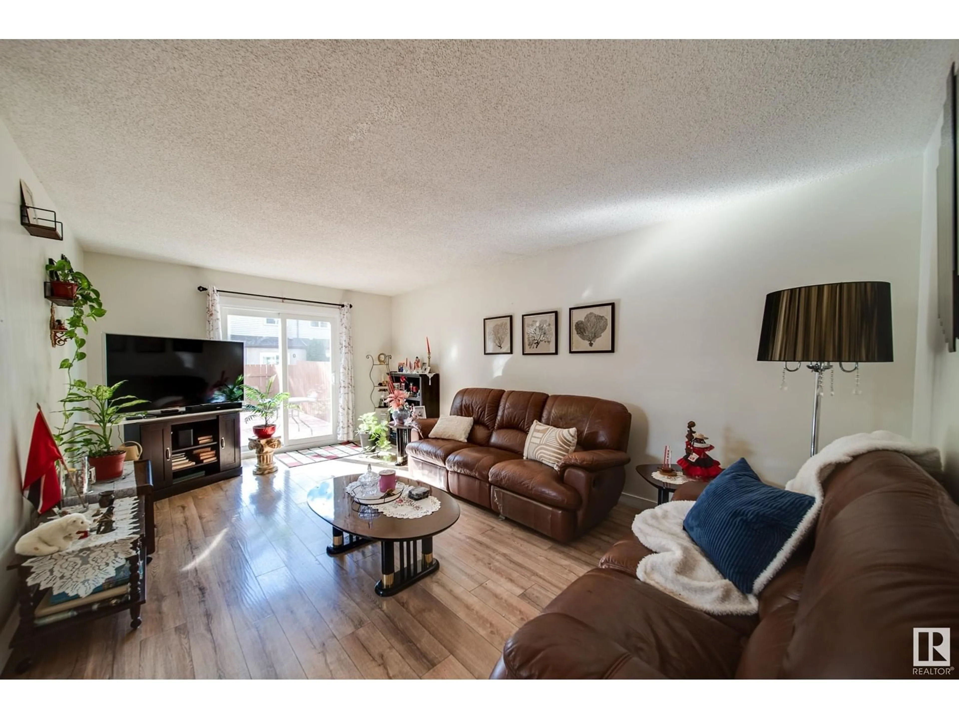 Living room, wood floors for 14269 23 ST NW, Edmonton Alberta T5Y1N1