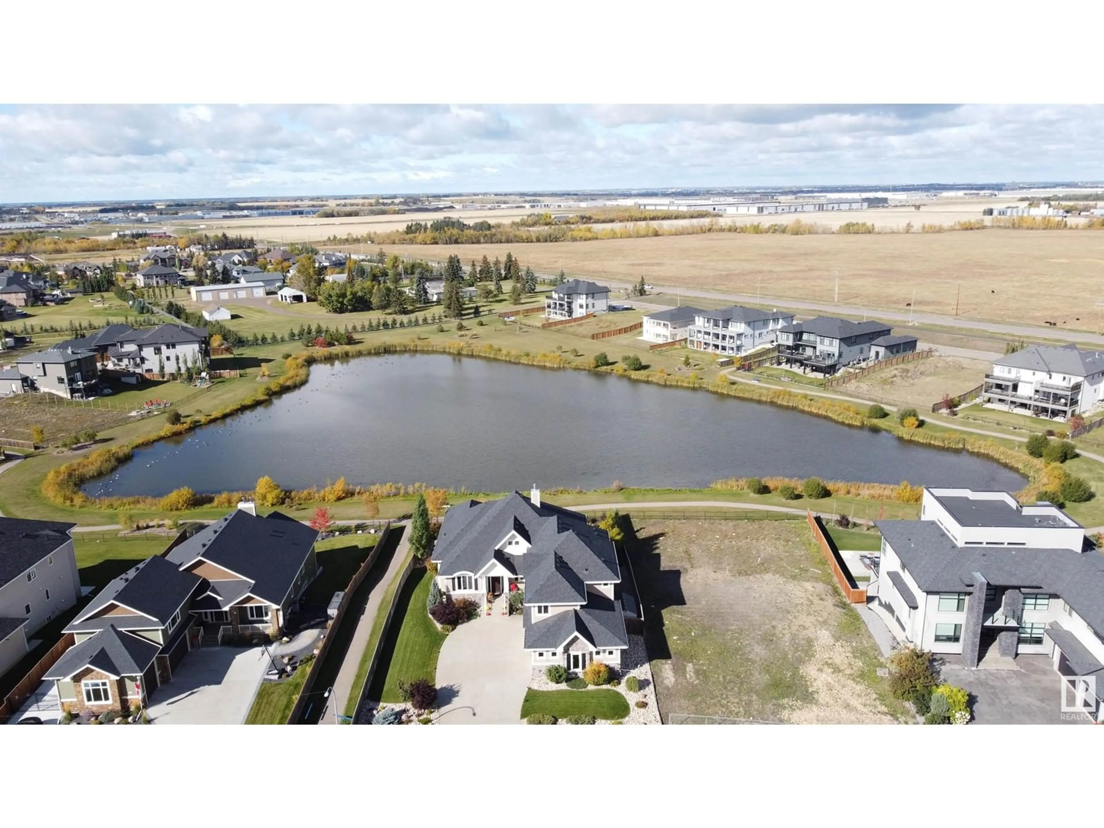 A pic from exterior of the house or condo, the view of lake or river for 2720 59 AV NE, Rural Leduc County Alberta T4X0X5