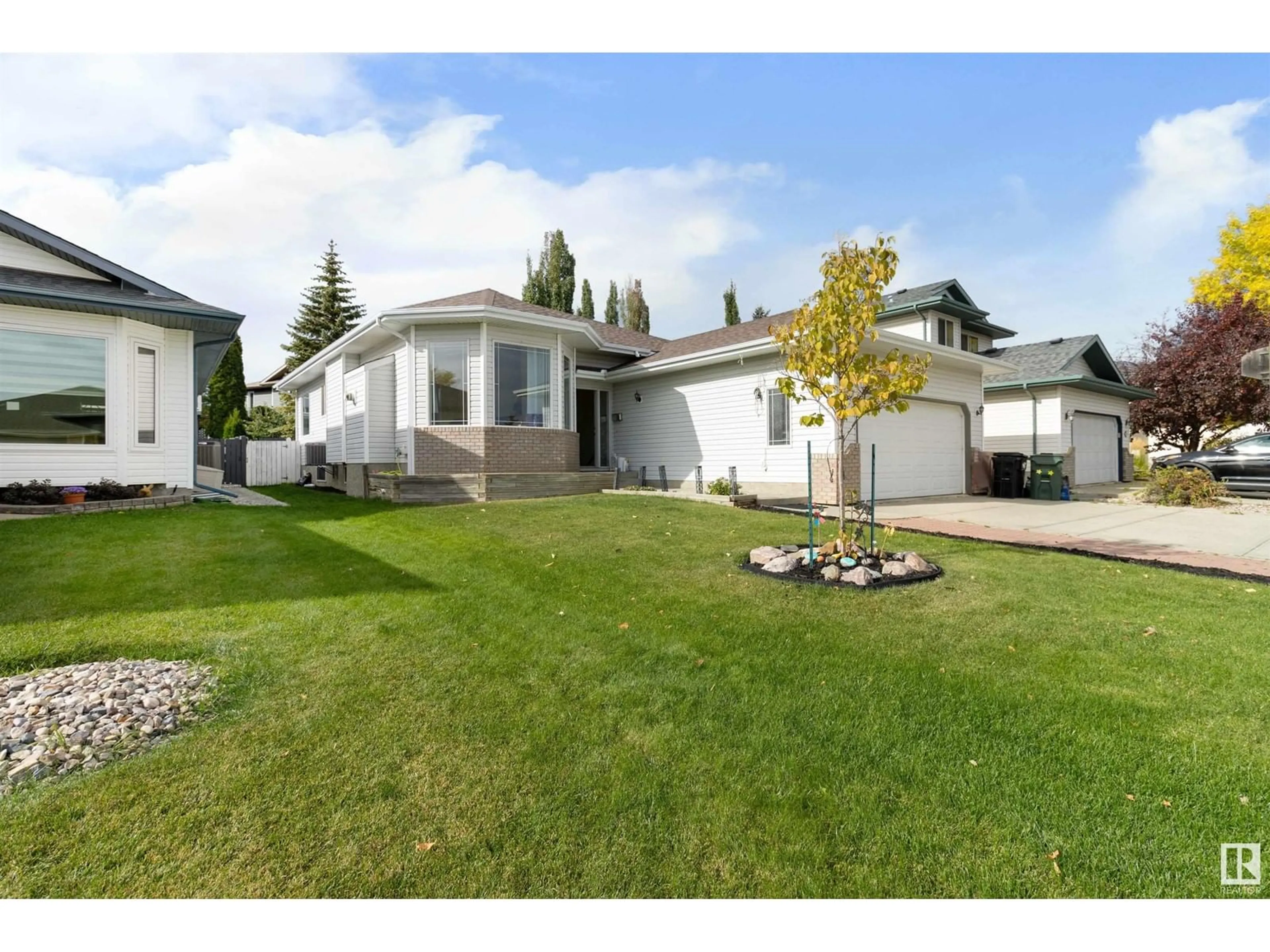 Frontside or backside of a home, the fenced backyard for 54 CHANCERY BA, Sherwood Park Alberta T8H1Z3