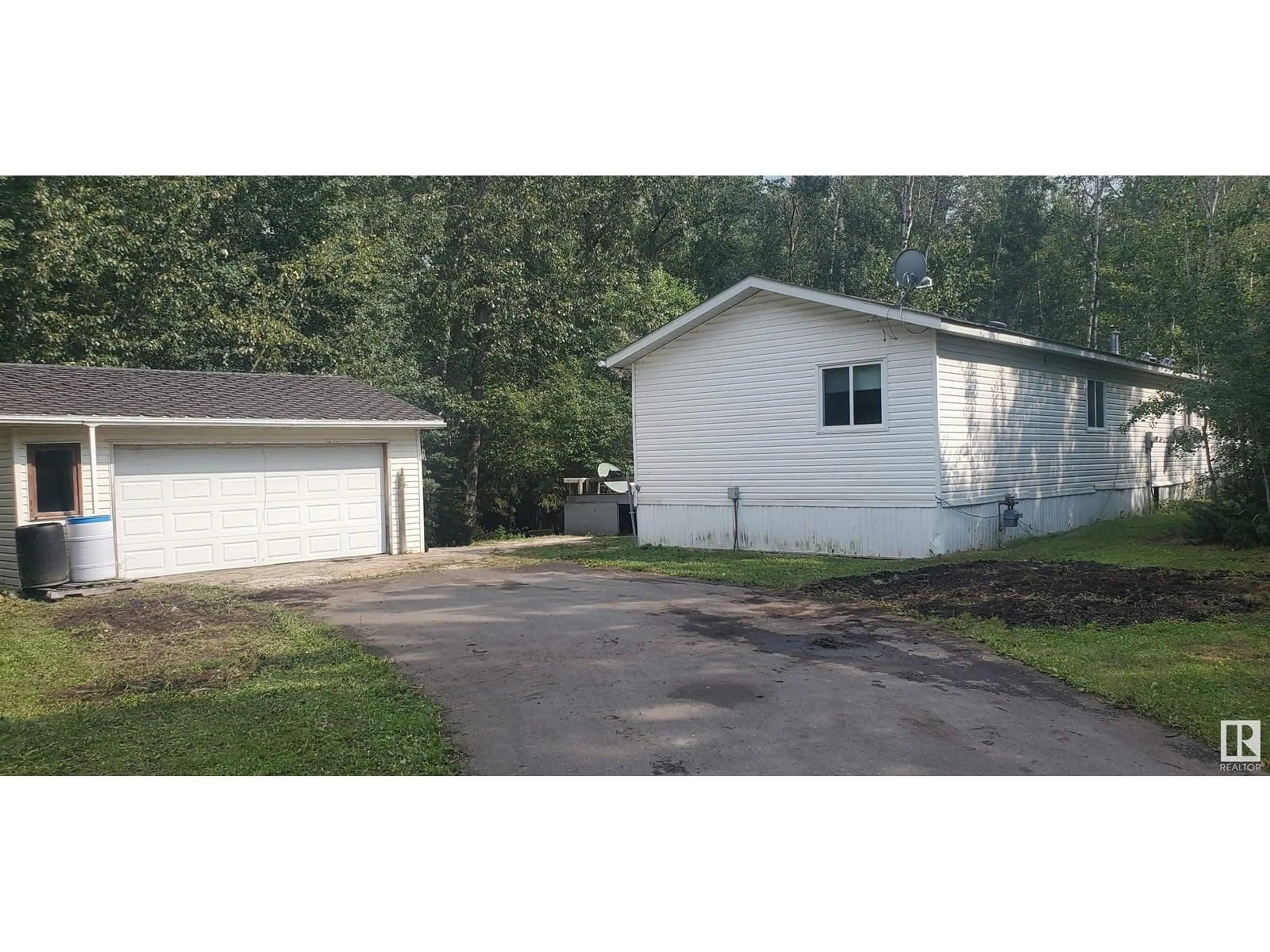 Frontside or backside of a home, cottage for #218 54425 STE. ANNE TR, Rural Lac Ste. Anne County Alberta T0E0A0