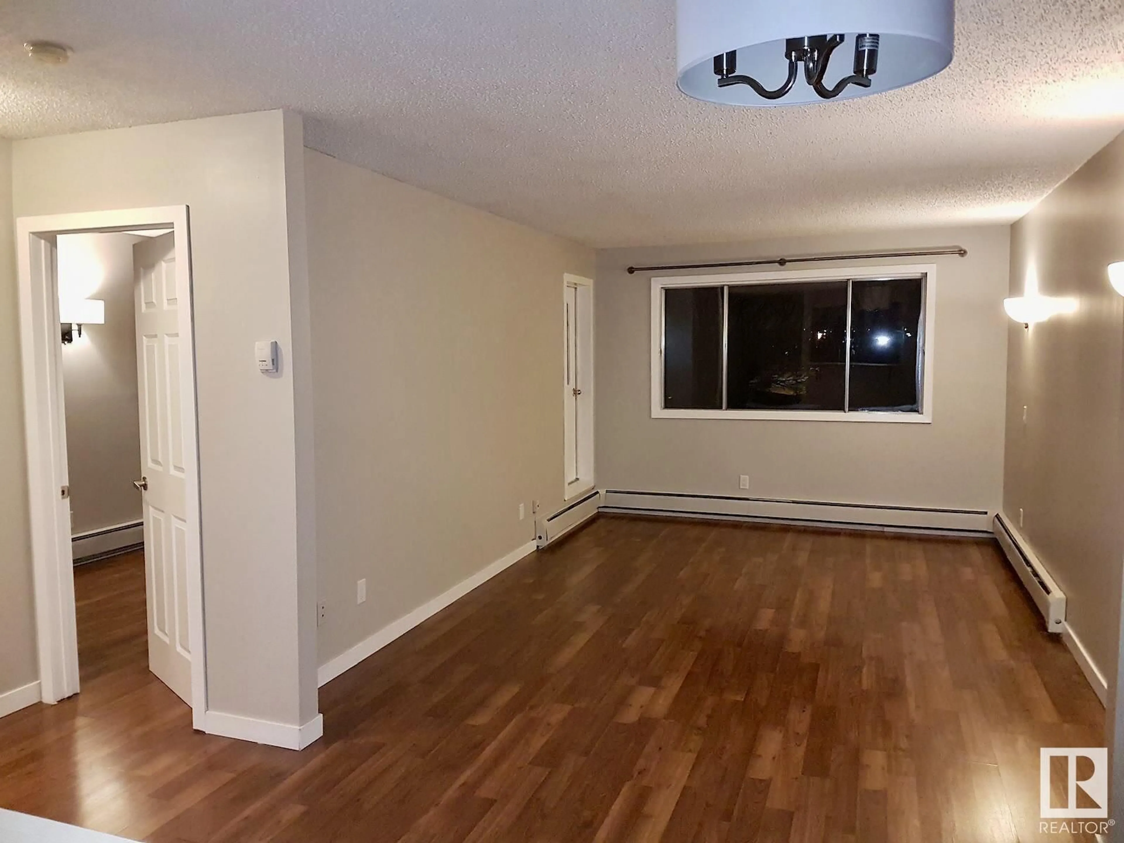 A pic of a room, wood floors for #306 14916 26 ST NW, Edmonton Alberta T5Y2G4