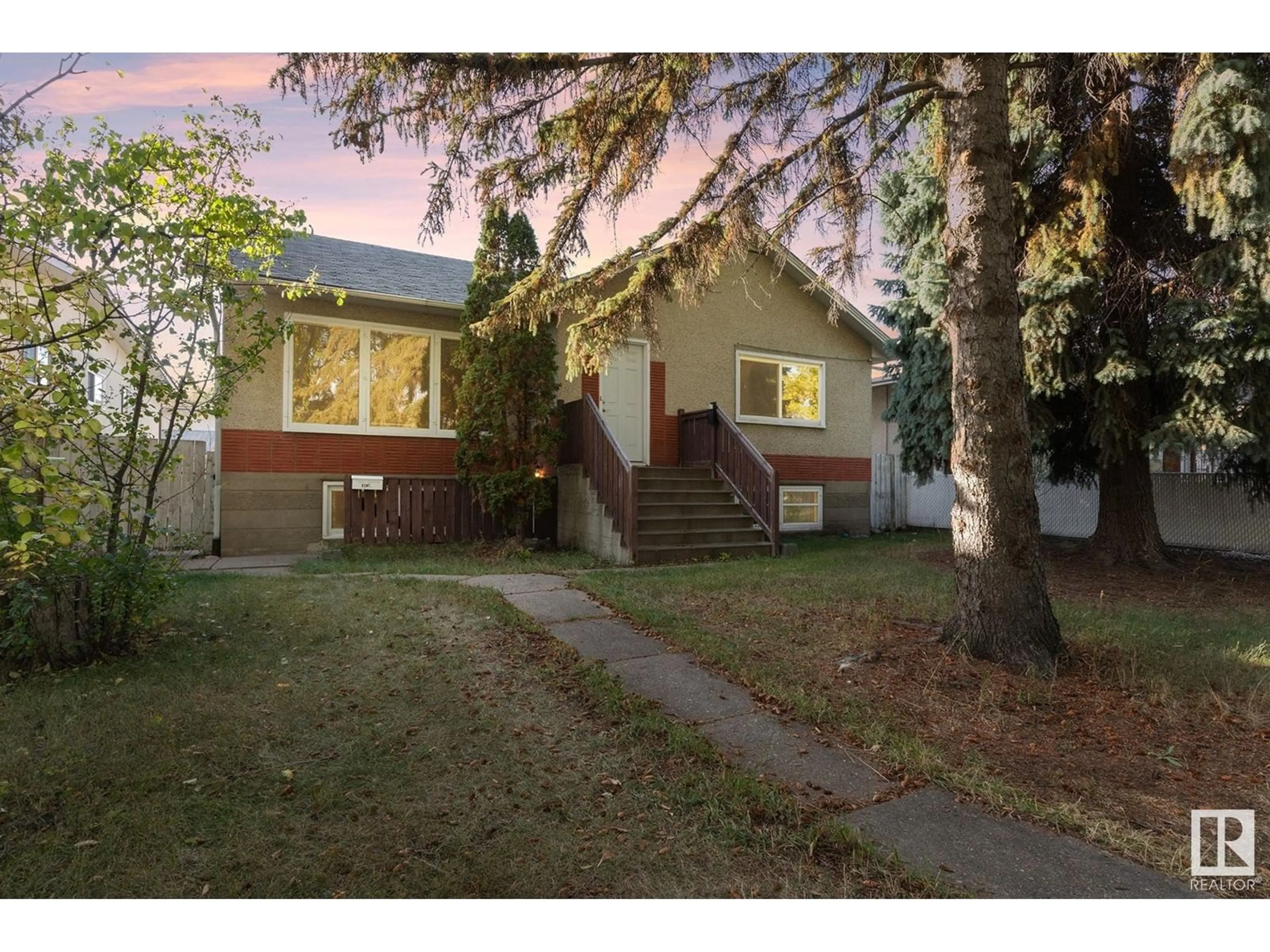 Frontside or backside of a home, cottage for 12010 102 ST NW, Edmonton Alberta T5G2G7