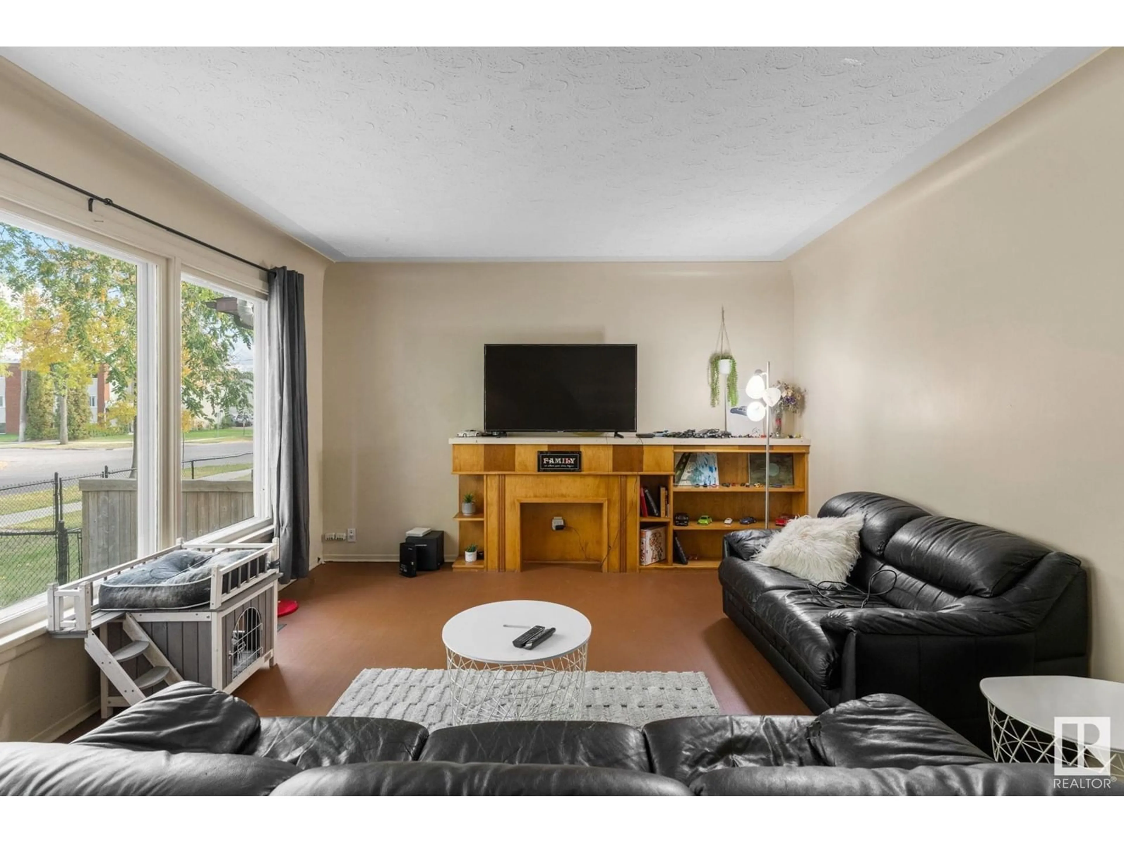 Living room, wood floors for 12010 102 ST NW, Edmonton Alberta T5G2G7